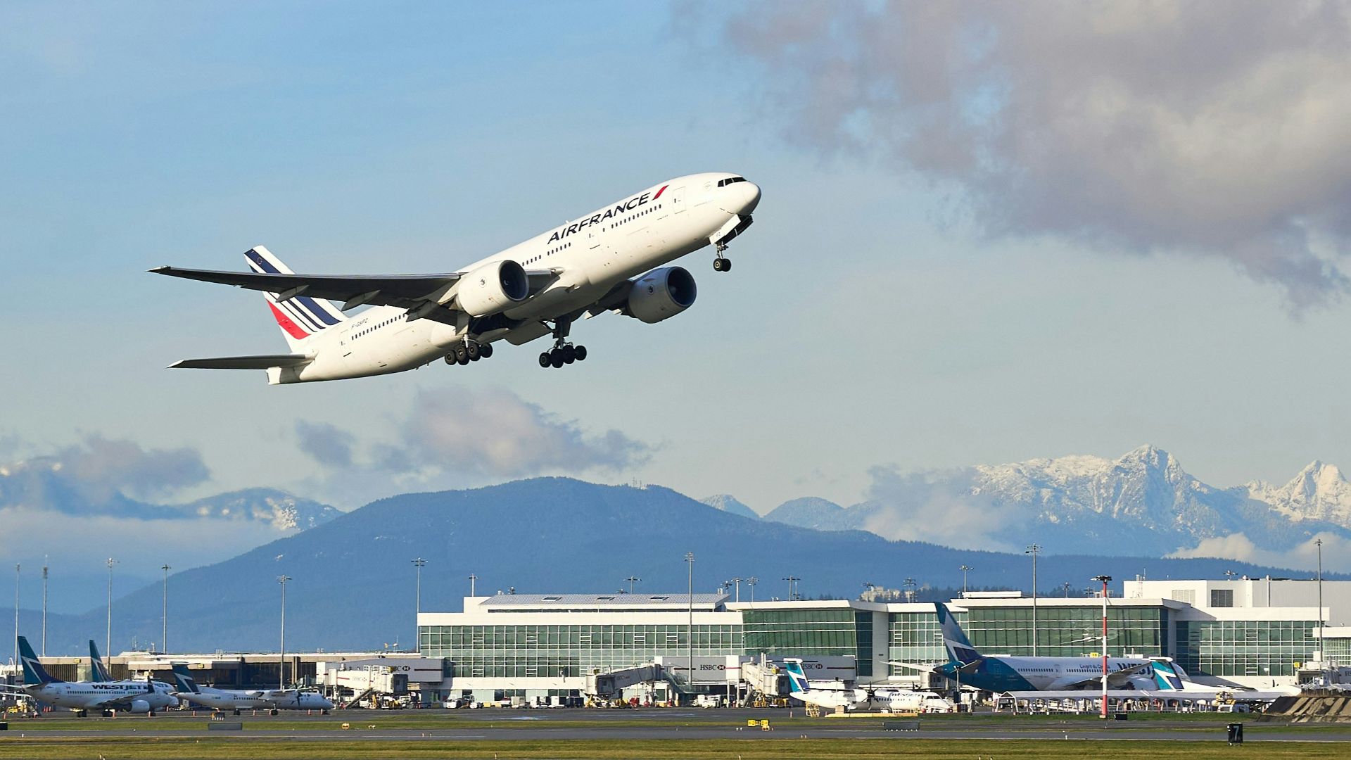 white passenger plane on airport during daytime