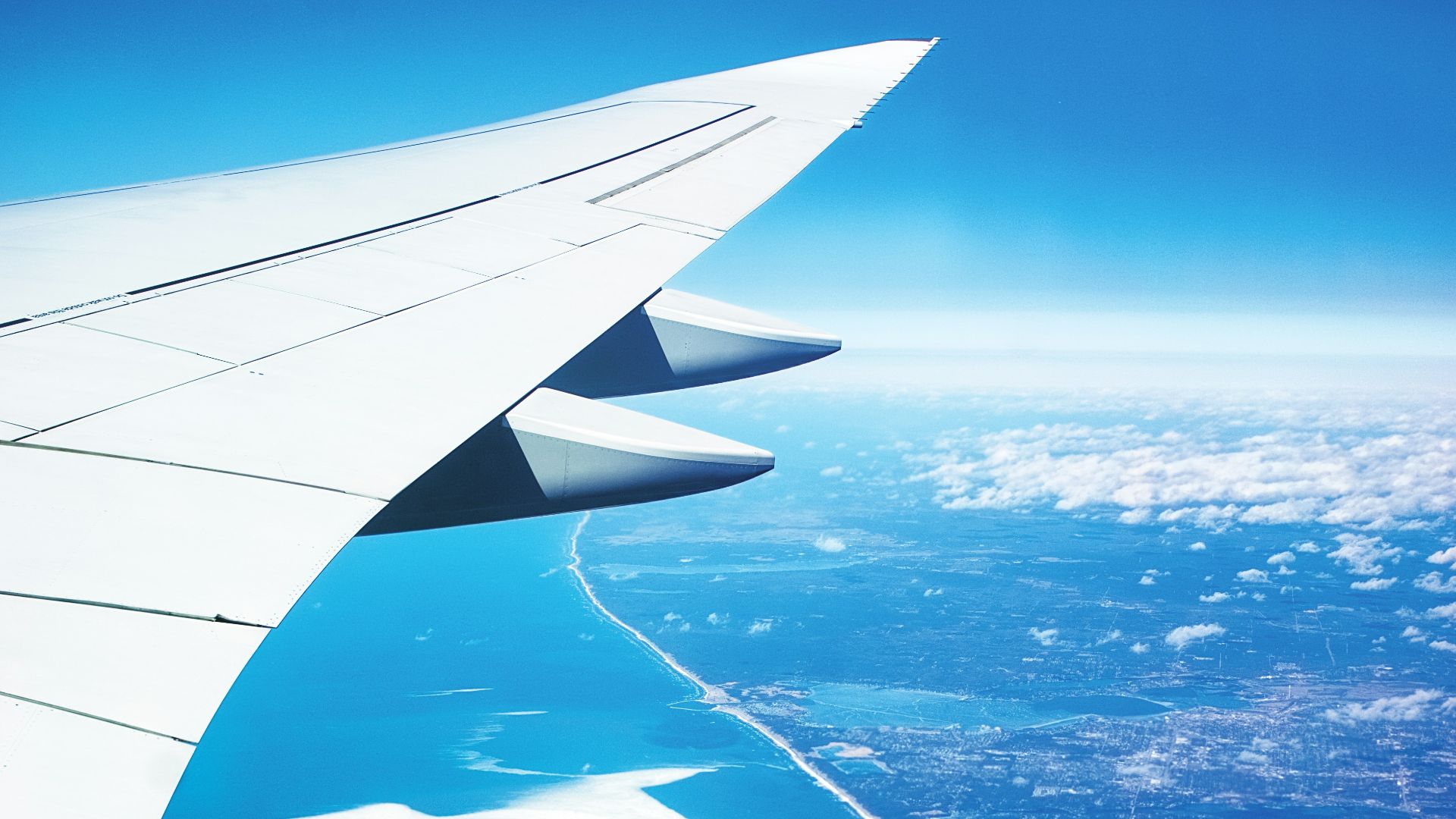 aerial photo of airplane wings during daytime
