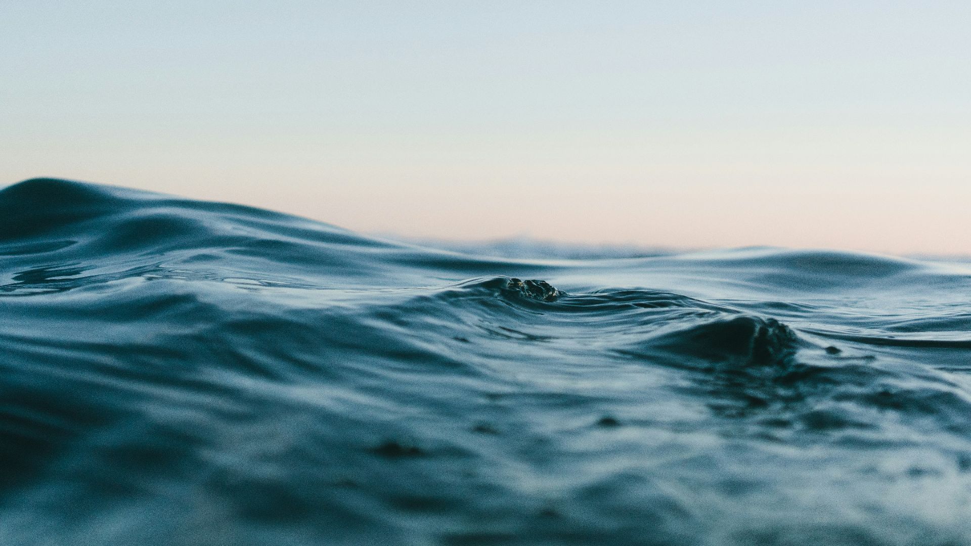 body of water under sky