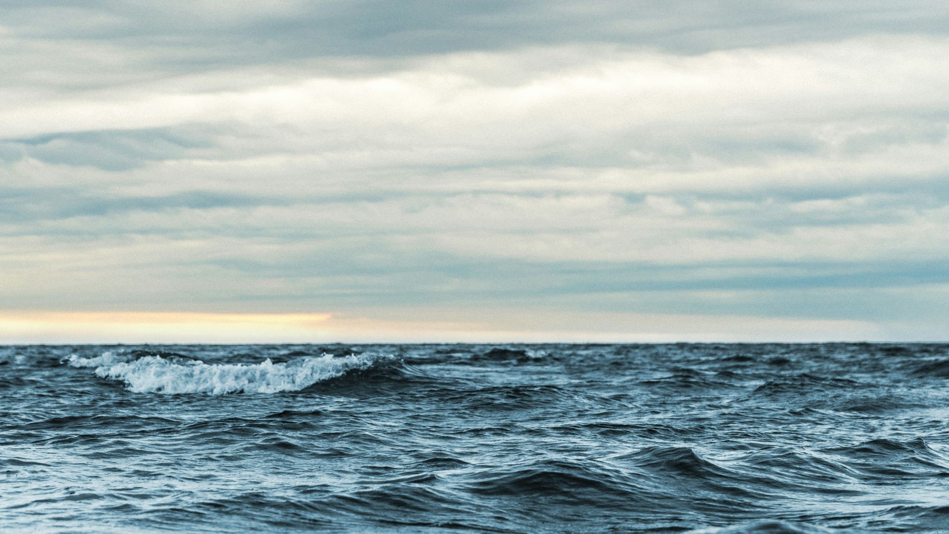 landscape photography of waves and clouds