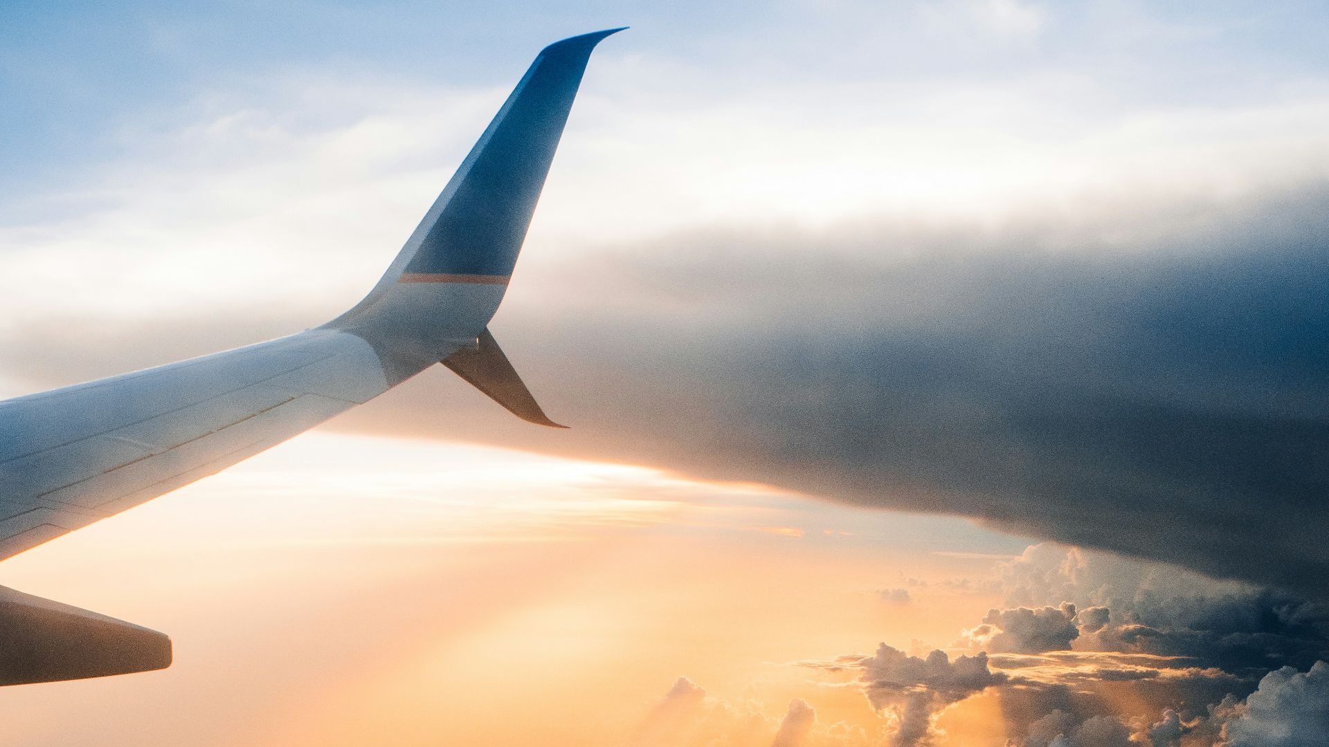 airplane on sky during golden hour