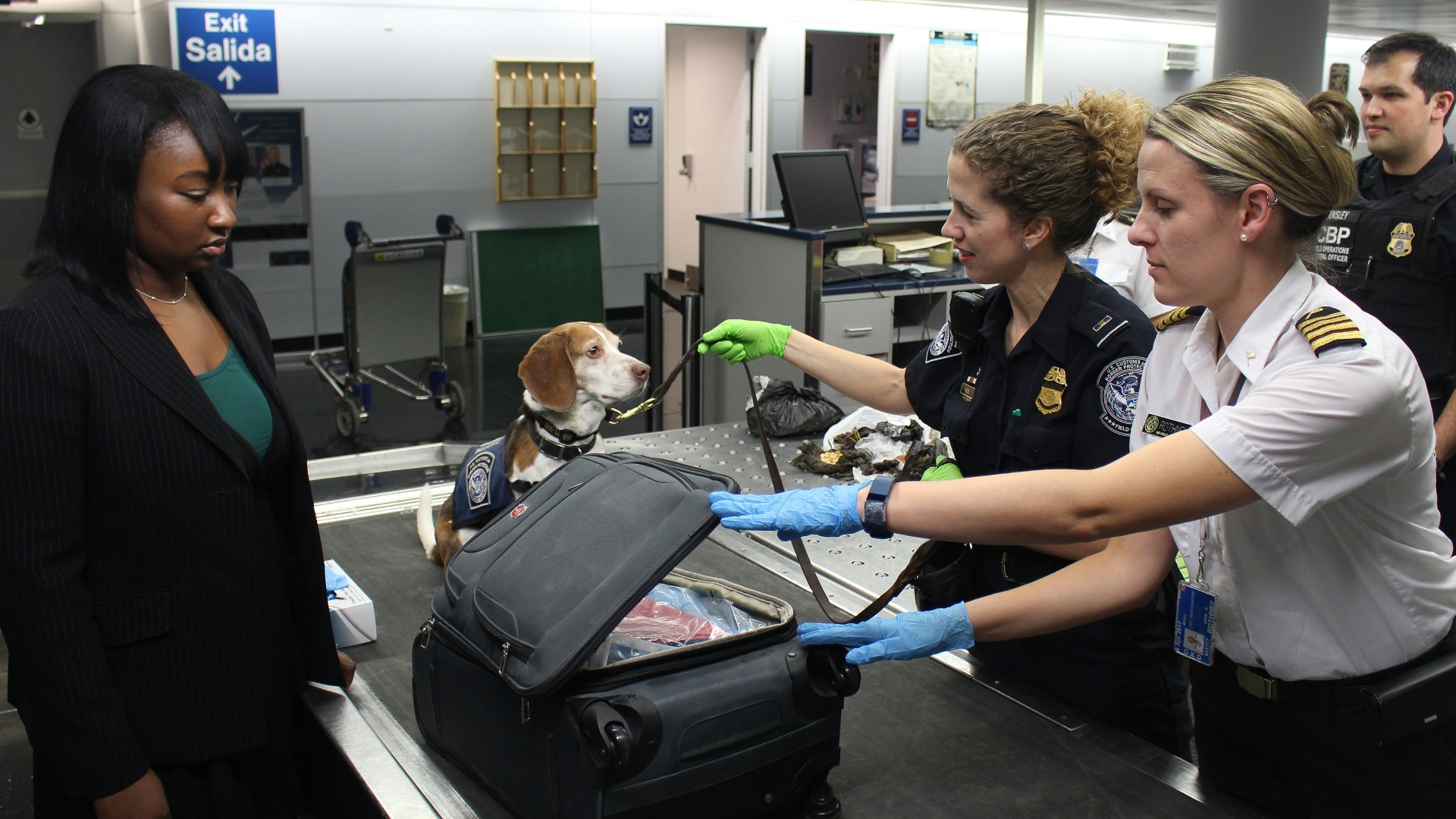 woman in black crew neck t-shirt standing beside woman in white t-shirt