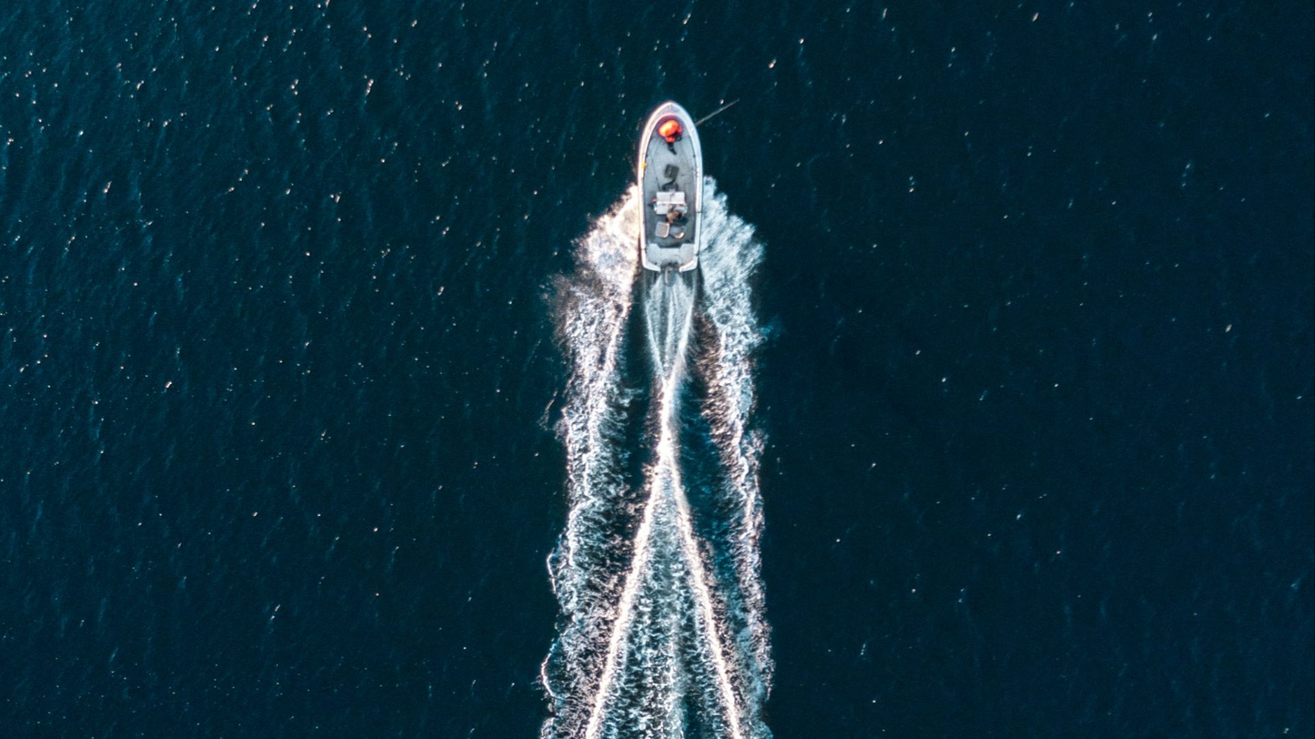 aerial photography of motorboat on sea
