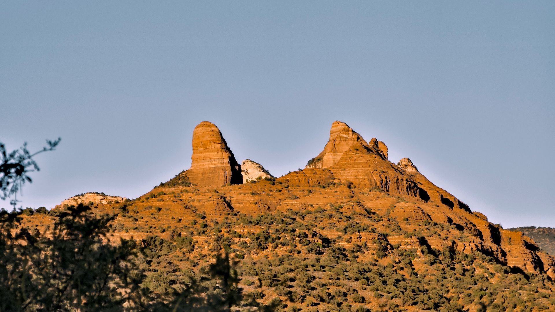 a mountain with a few rocks on top of it