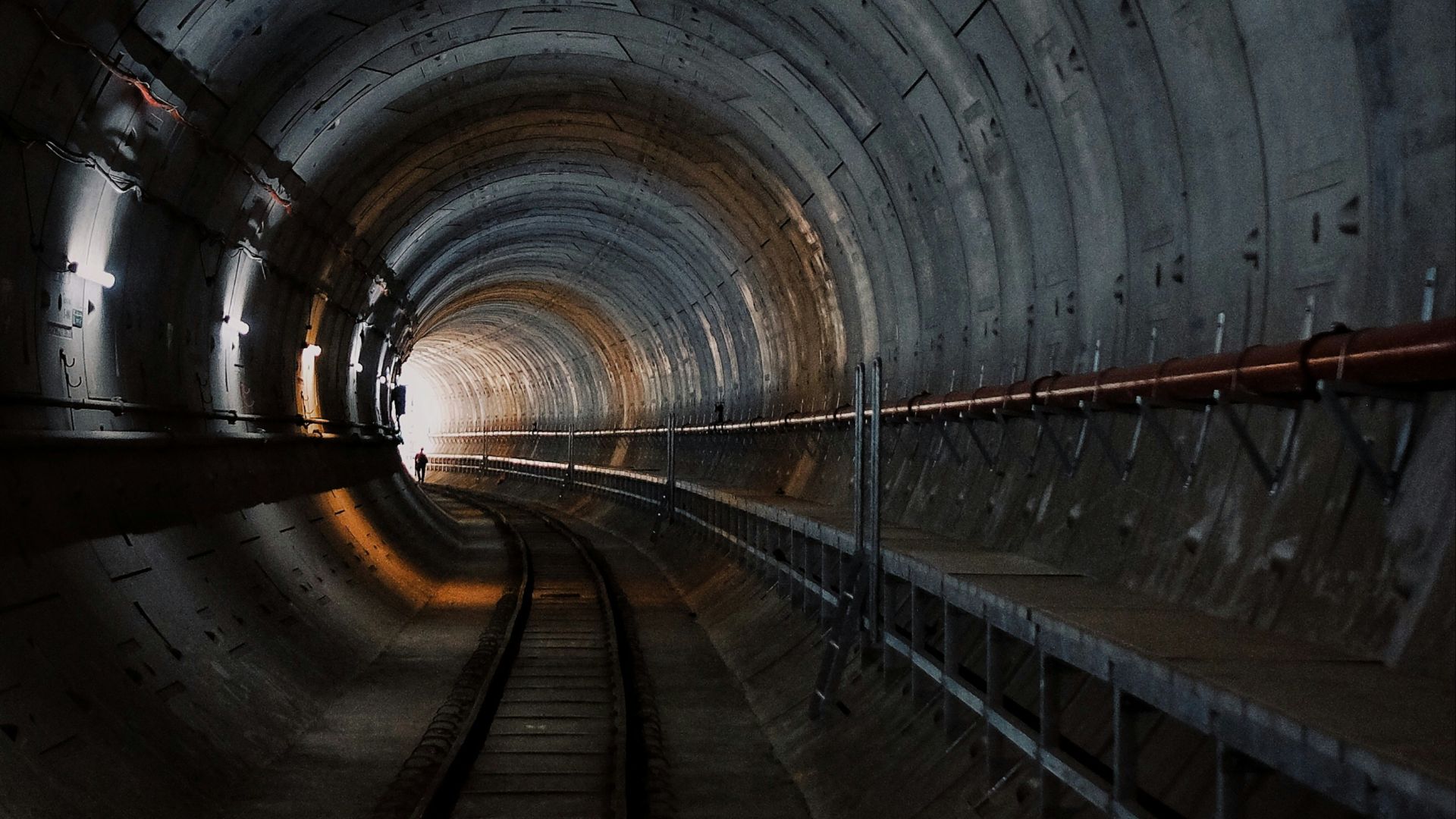 photo of train rail tunnel