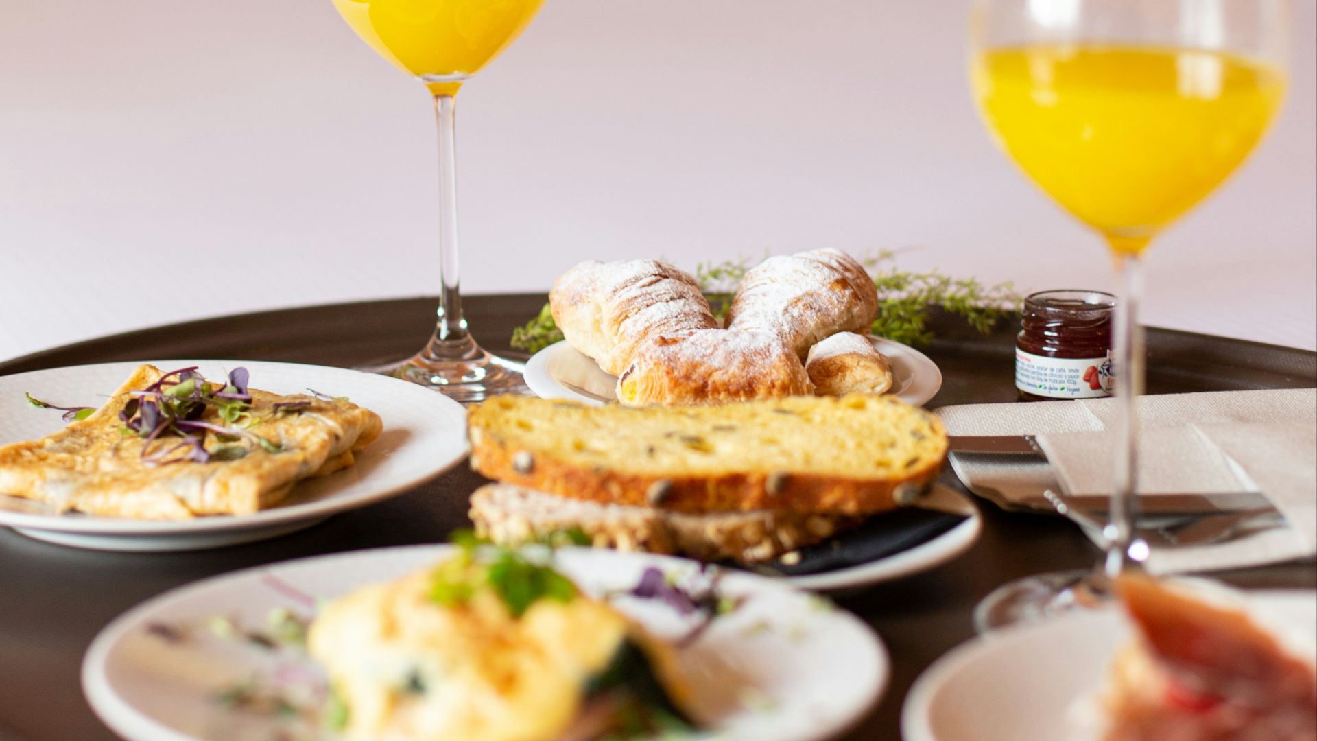 bread with sliced lemon on white ceramic plate