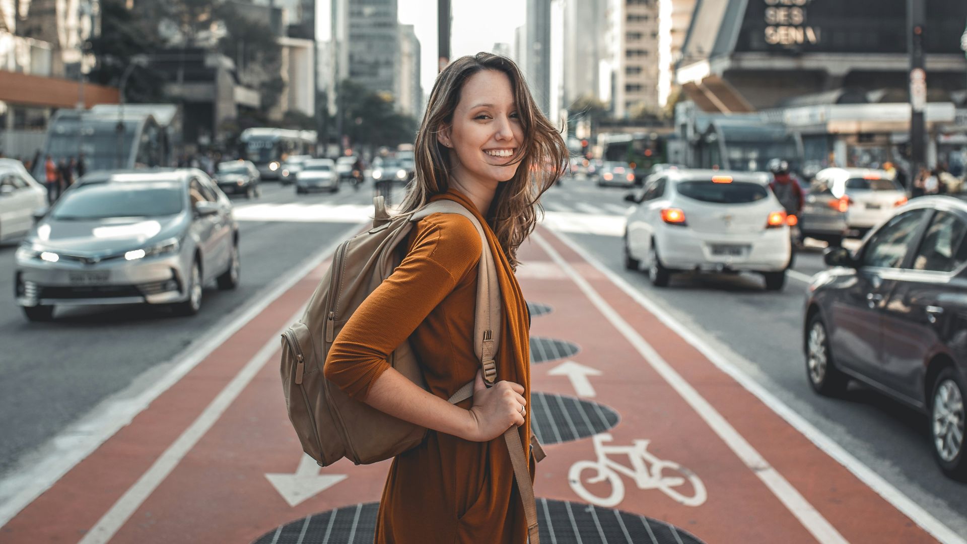 woman standing on middle of road