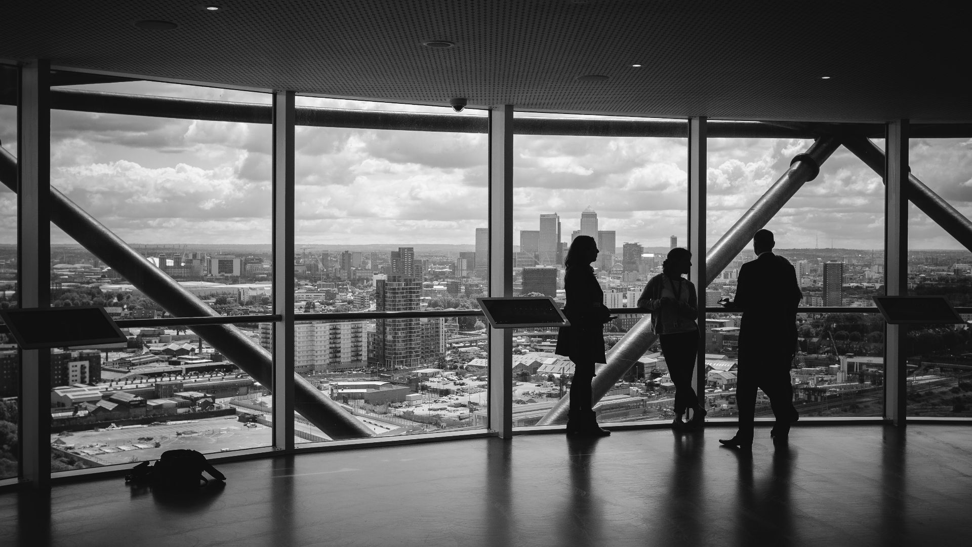 people standing inside city building