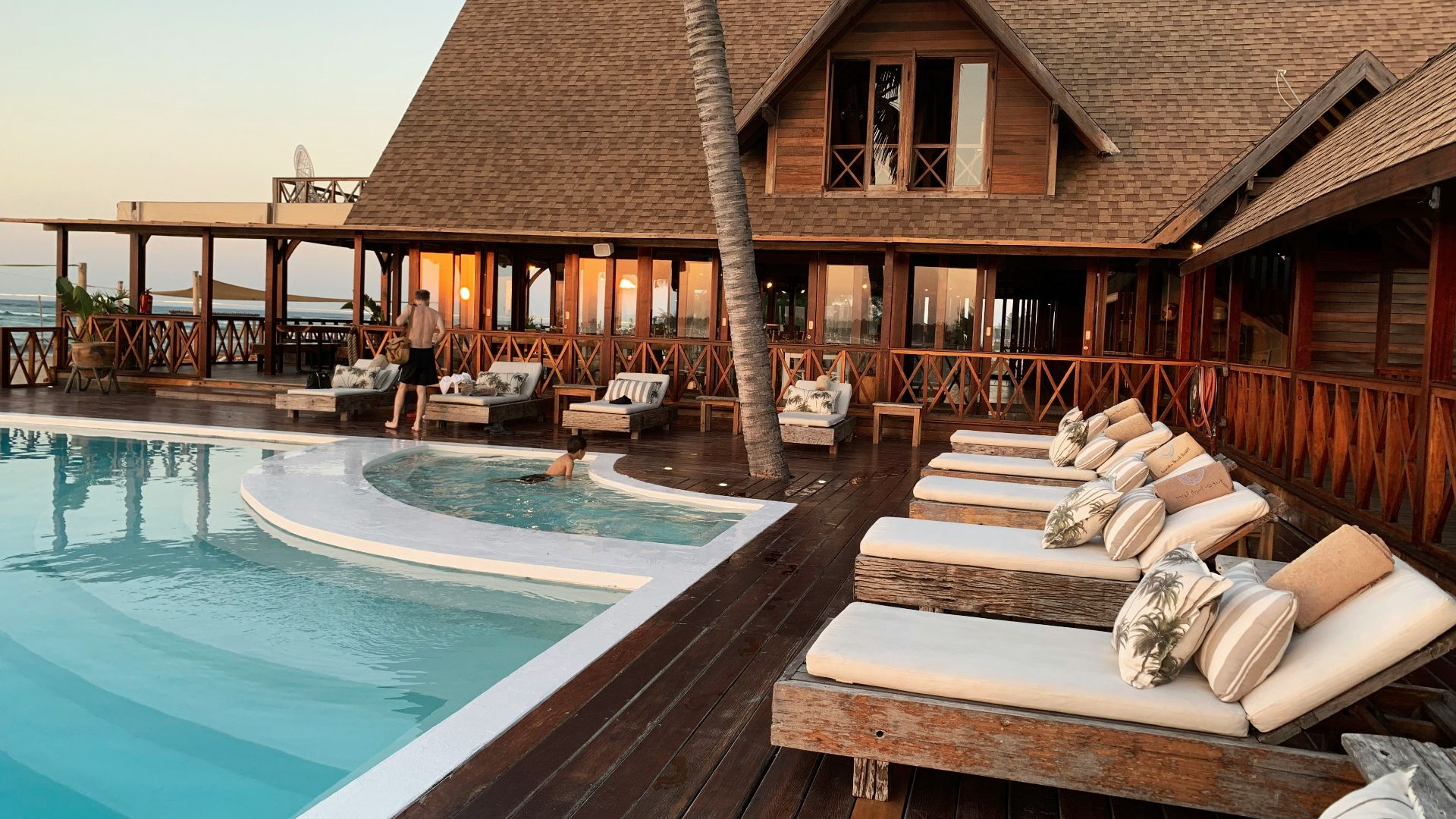 person in swimming pool during daytime