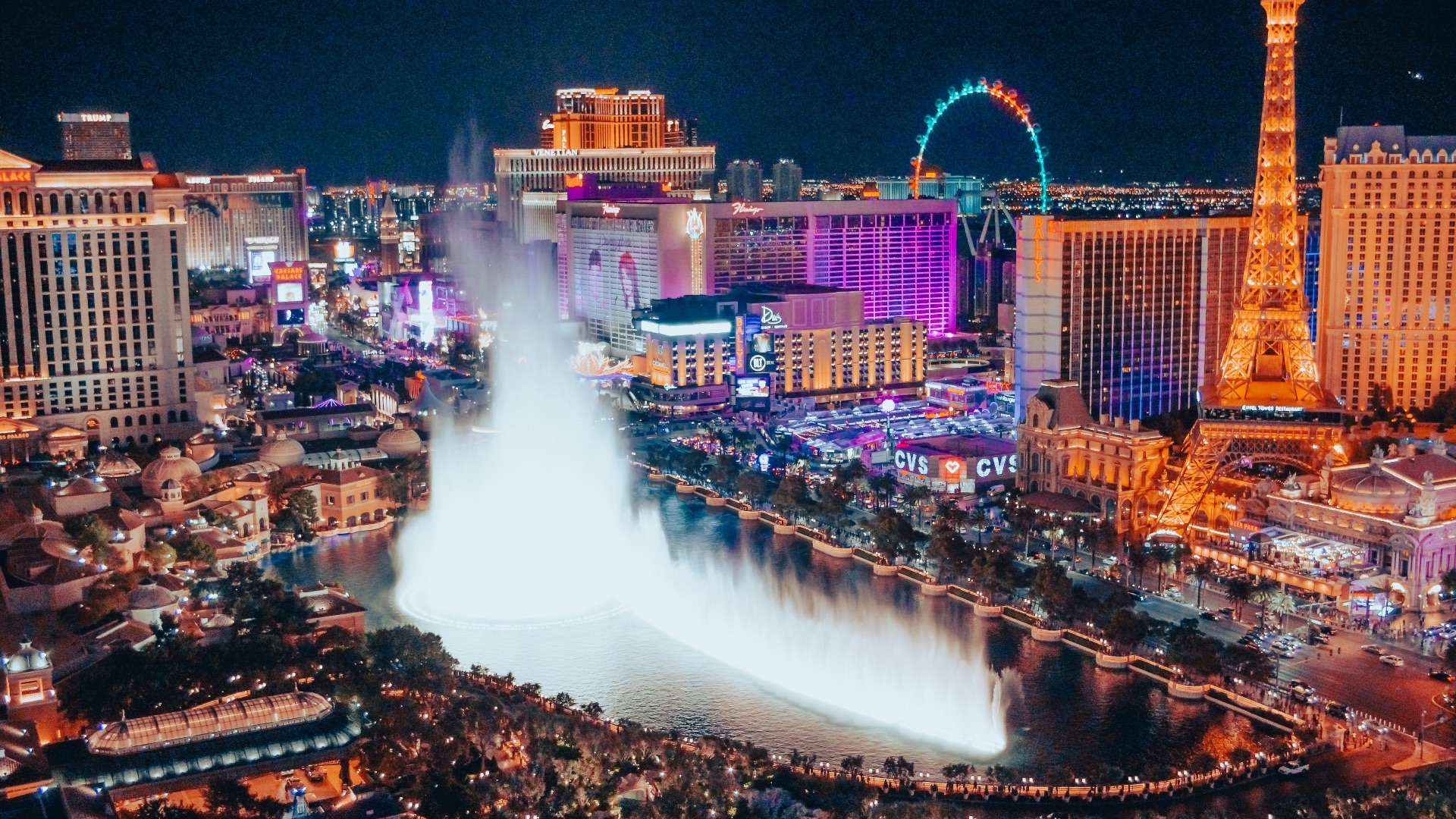 a city with a fountain in the middle of it