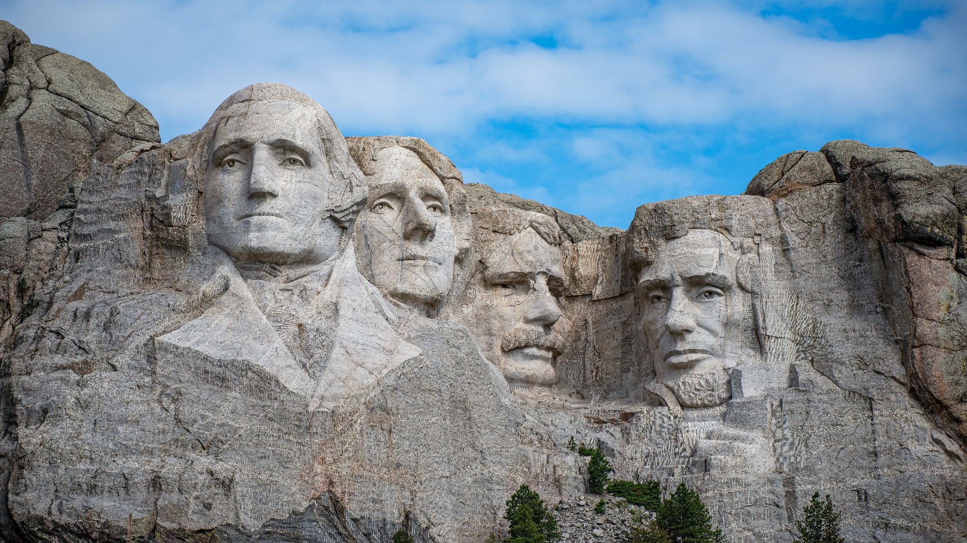 a group of presidents carved into the side of a mountain