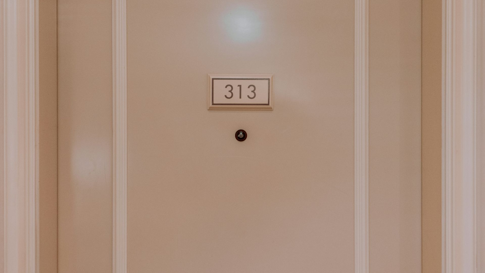 a white door with a number on it
