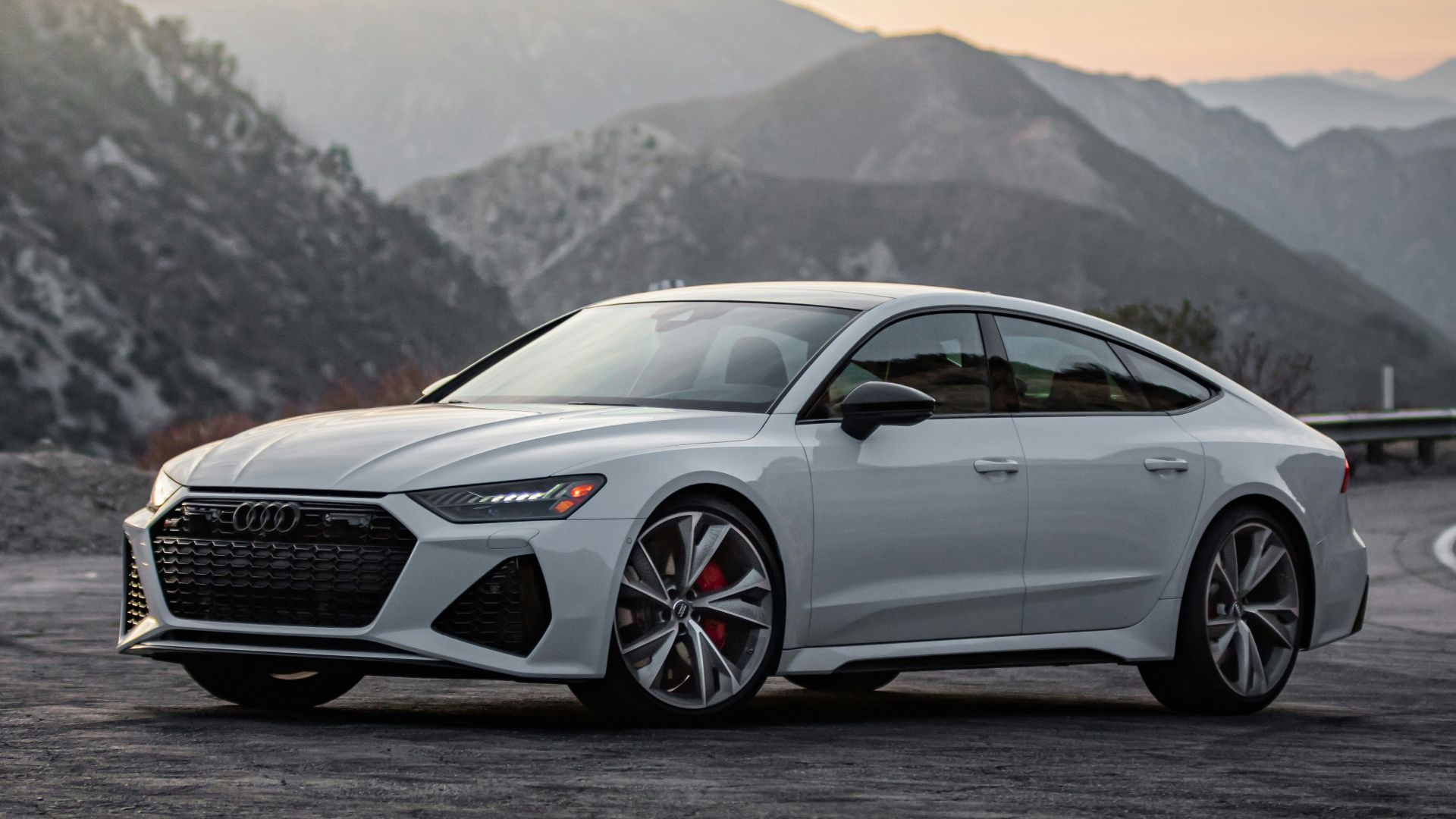 white mercedes benz coupe on road during daytime