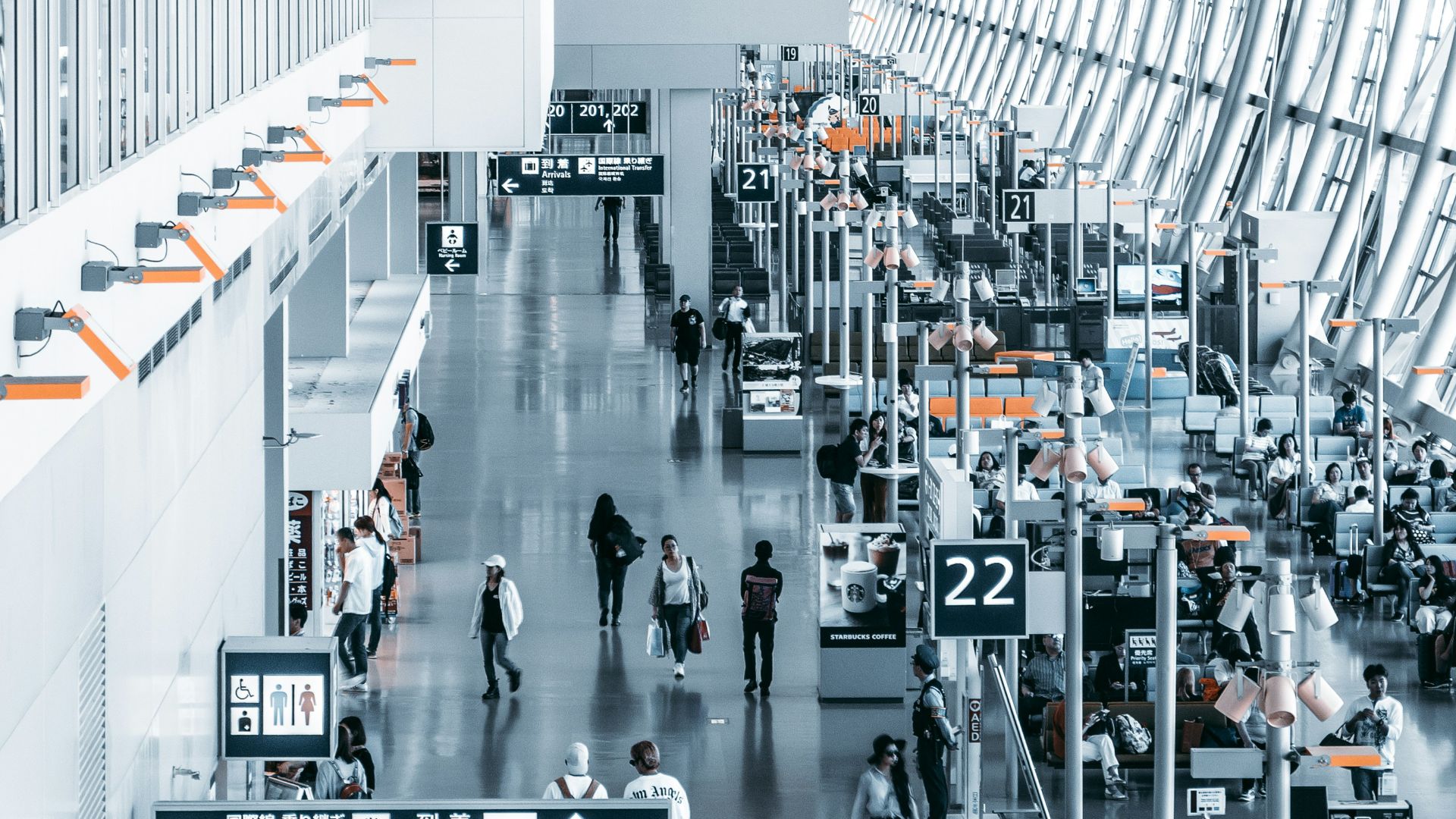 people walking inside airport station