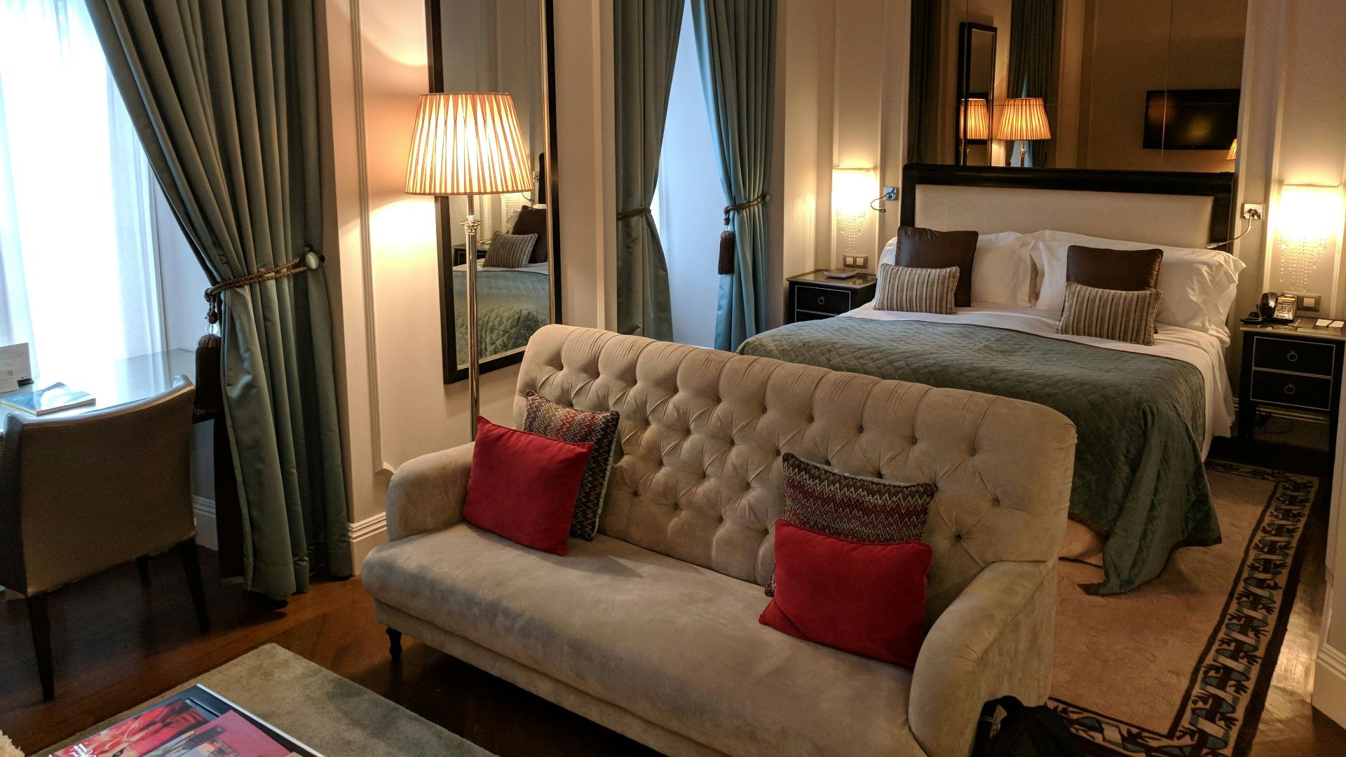 red throw pillow on white couch