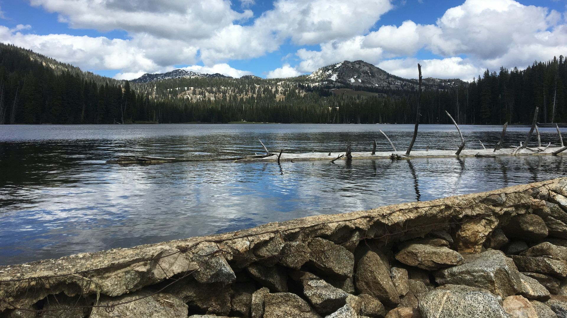 gray stones near body of water