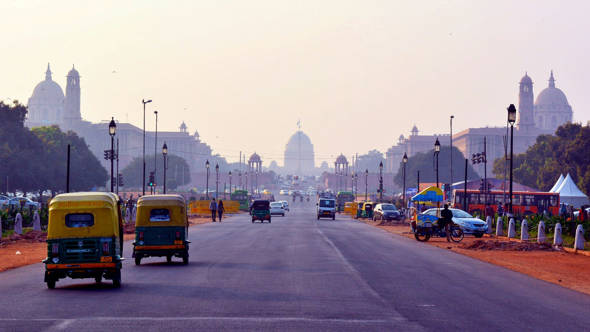 yellow bus on road during daytime