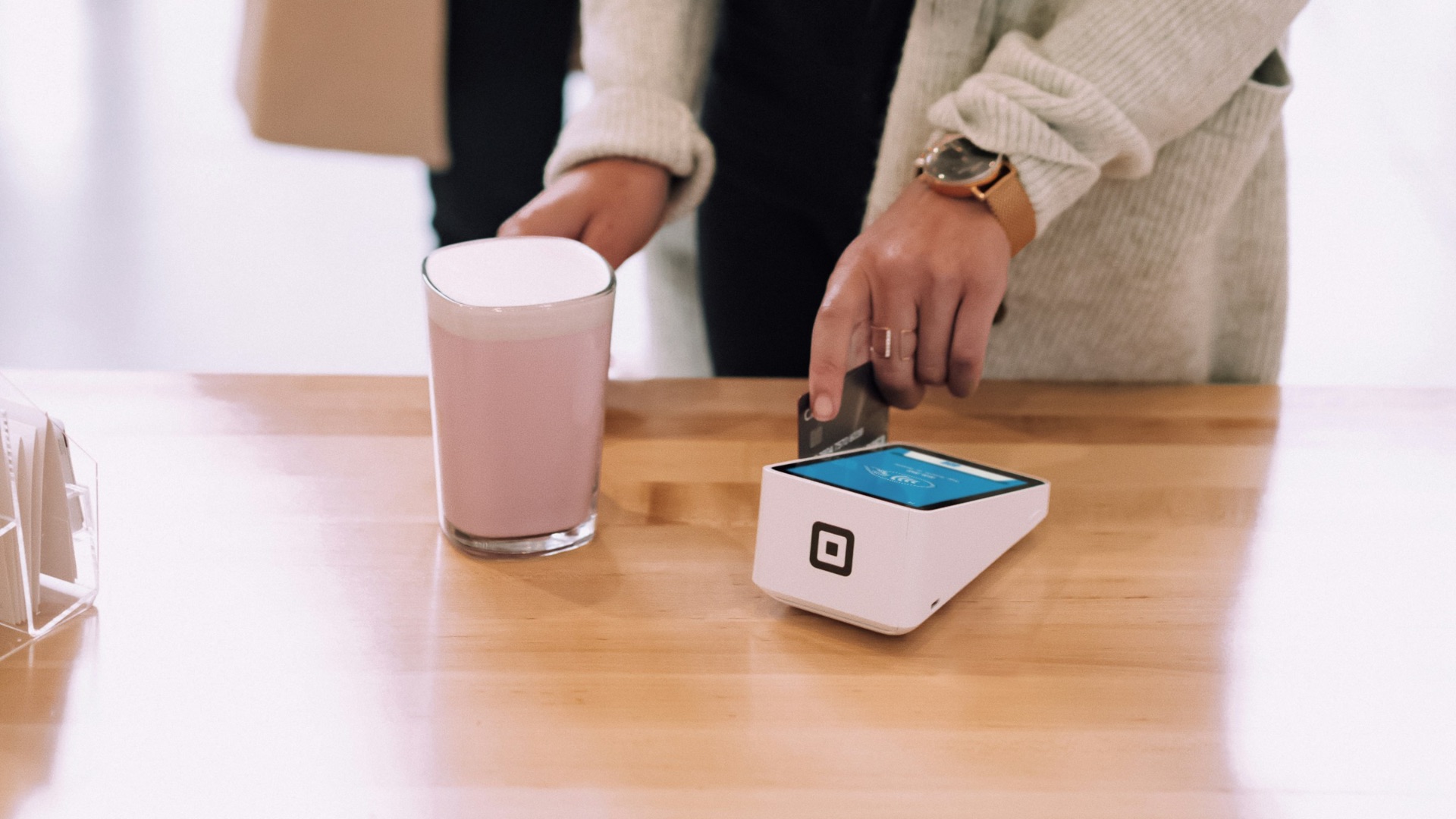 woman using white device