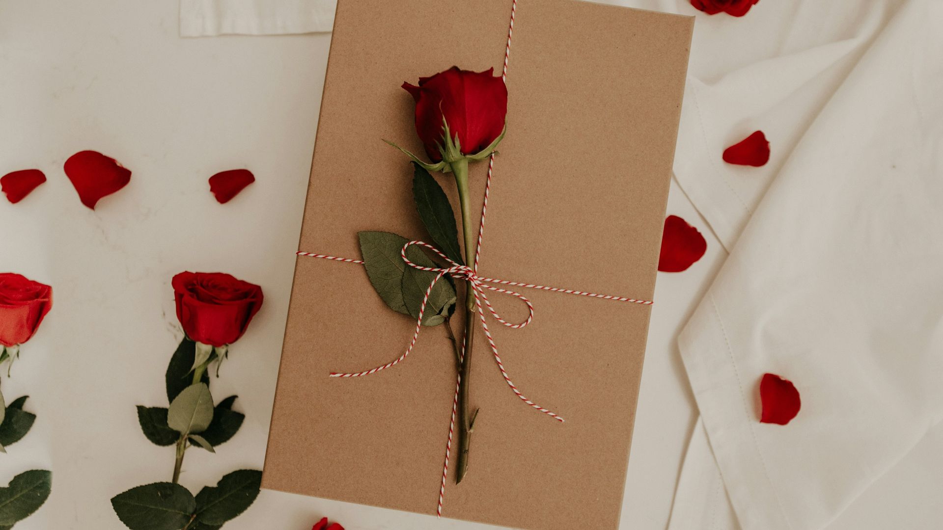 red rose on brown envelope