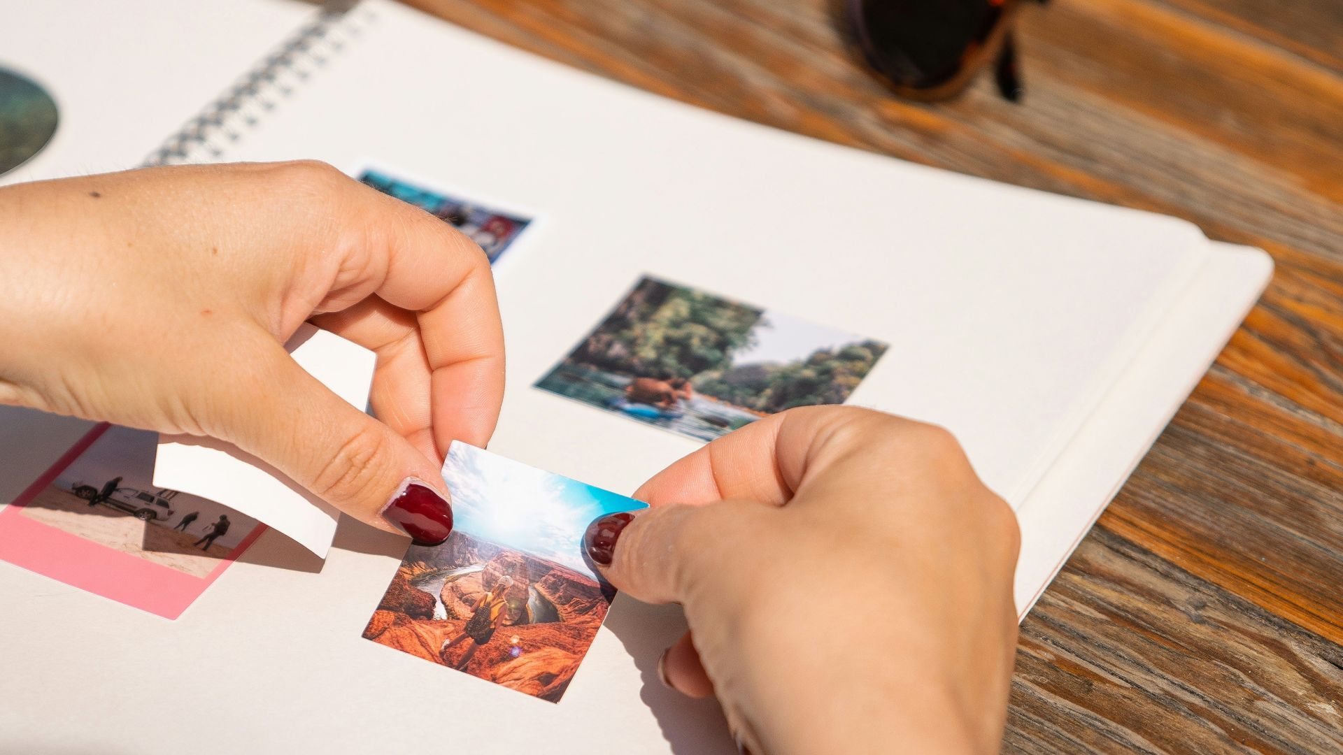 a person holding a toothbrush over a book