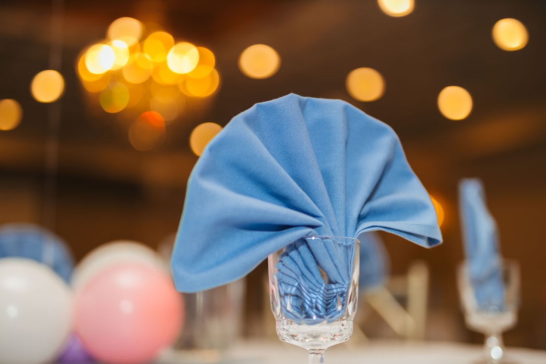 teal handkerchief on goblet glass