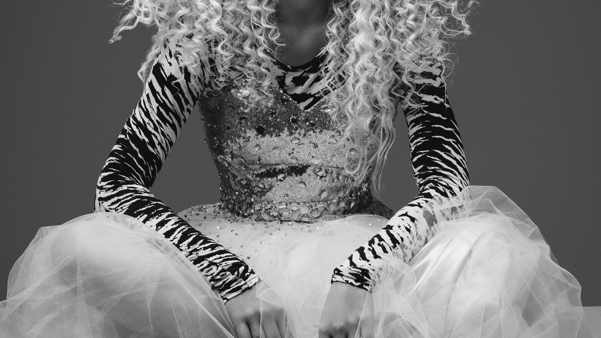 woman in black and white long sleeve dress