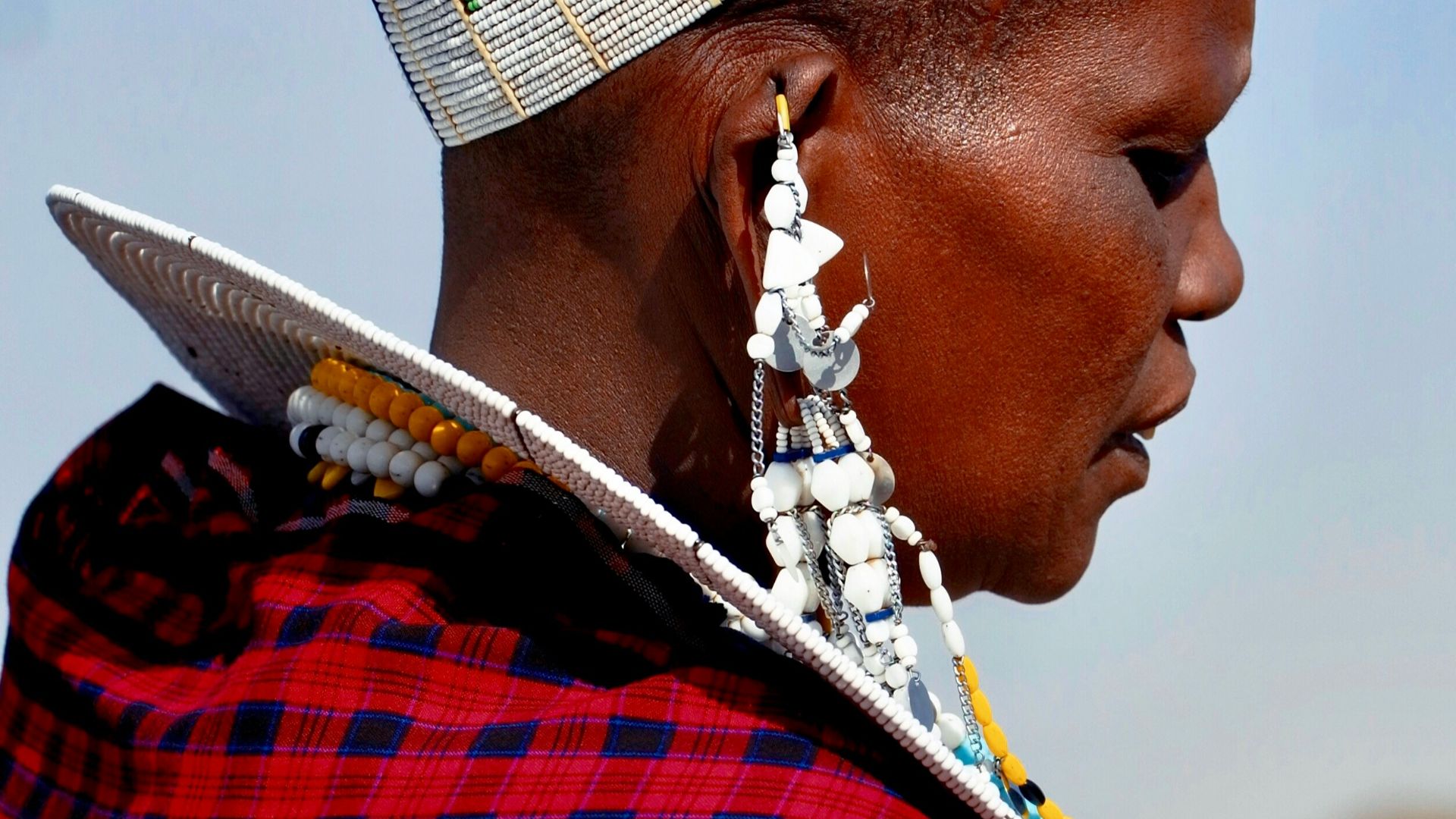 selective focus photography of woman wearing traditional dress