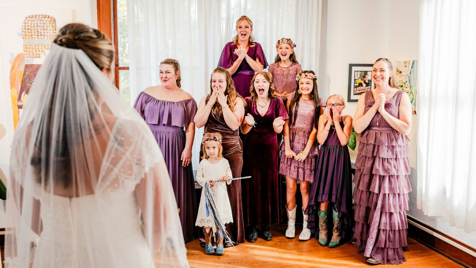 a group of women standing next to each other