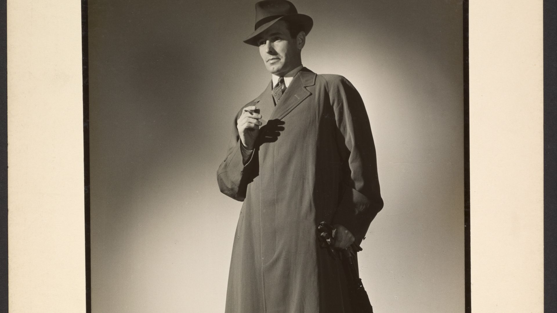 File:Man modeling trench coat, by Günther Krampf (Getty 104D8S).jpg
