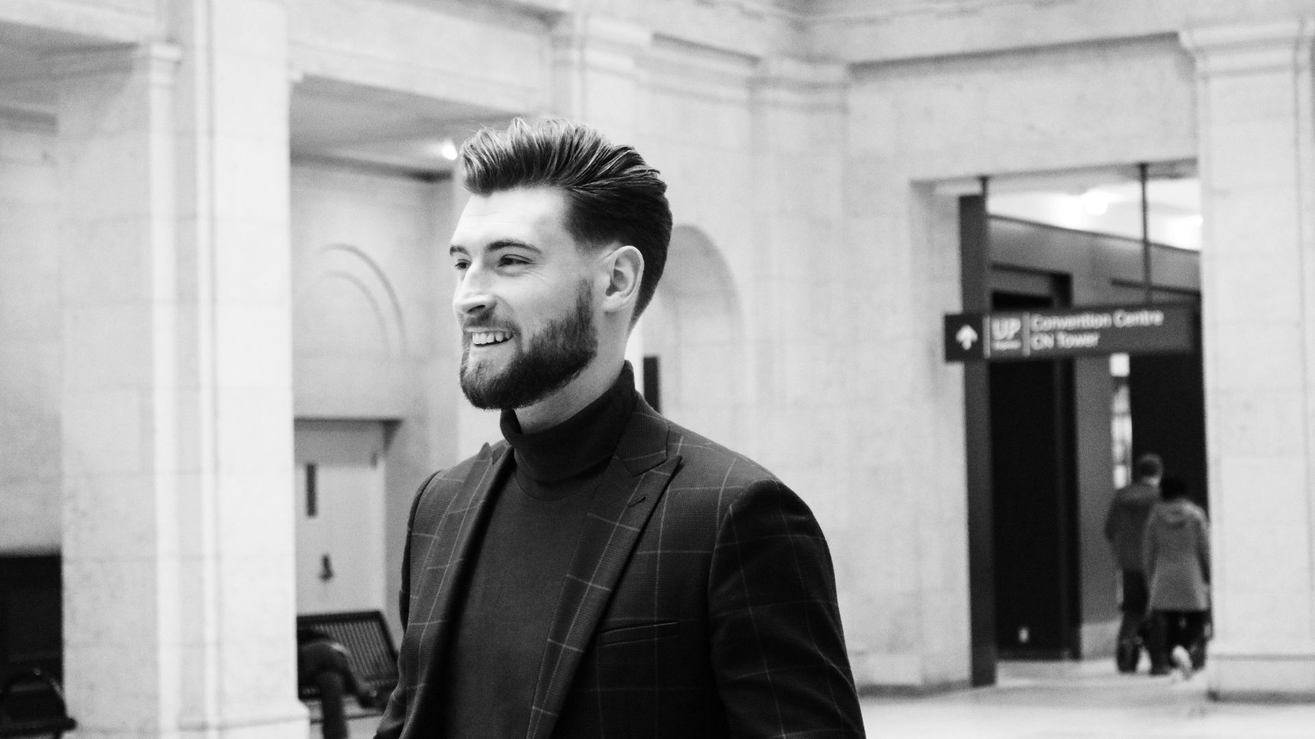 man in black suit jacket