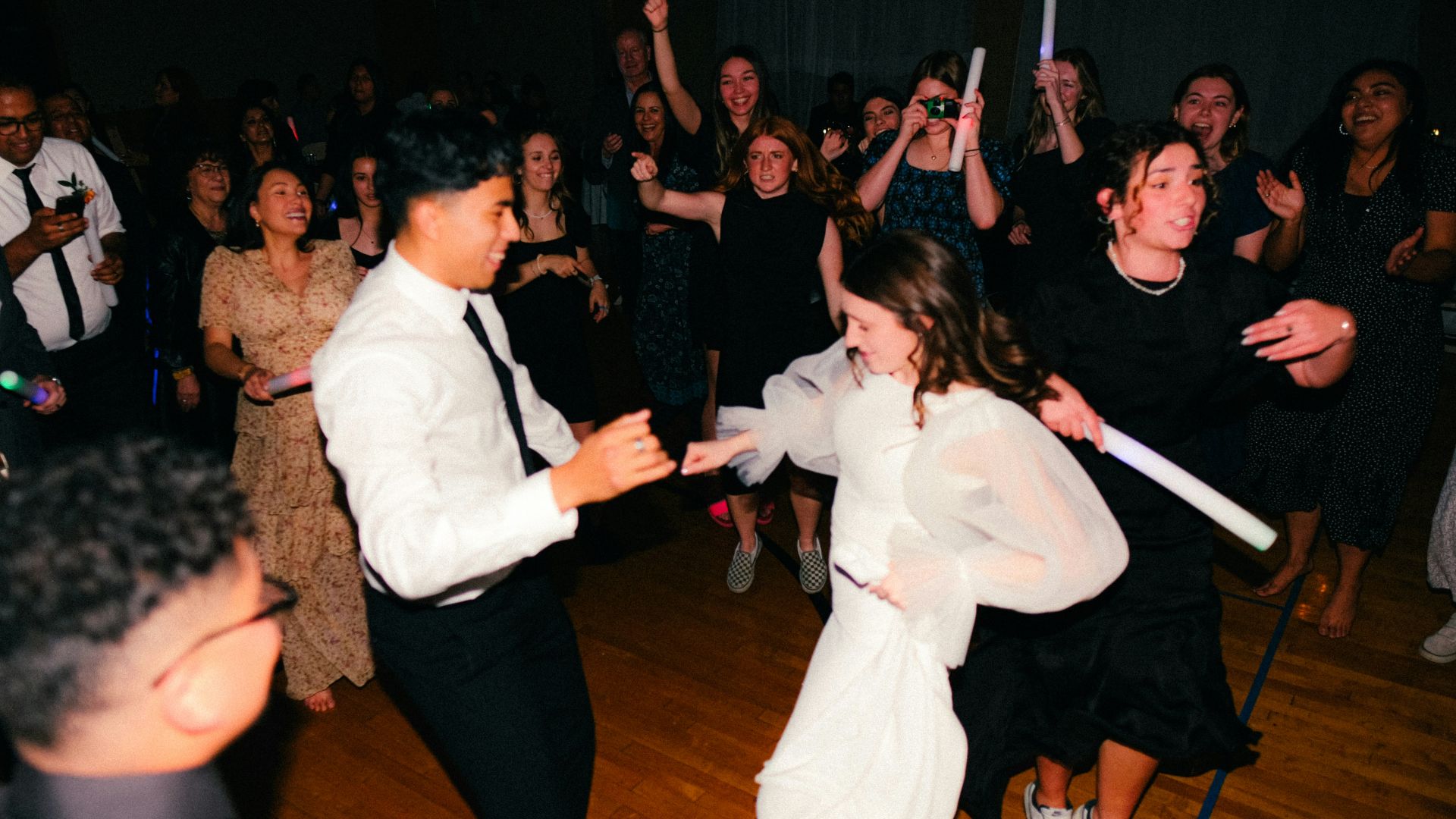 a couple of people that are on a dance floor