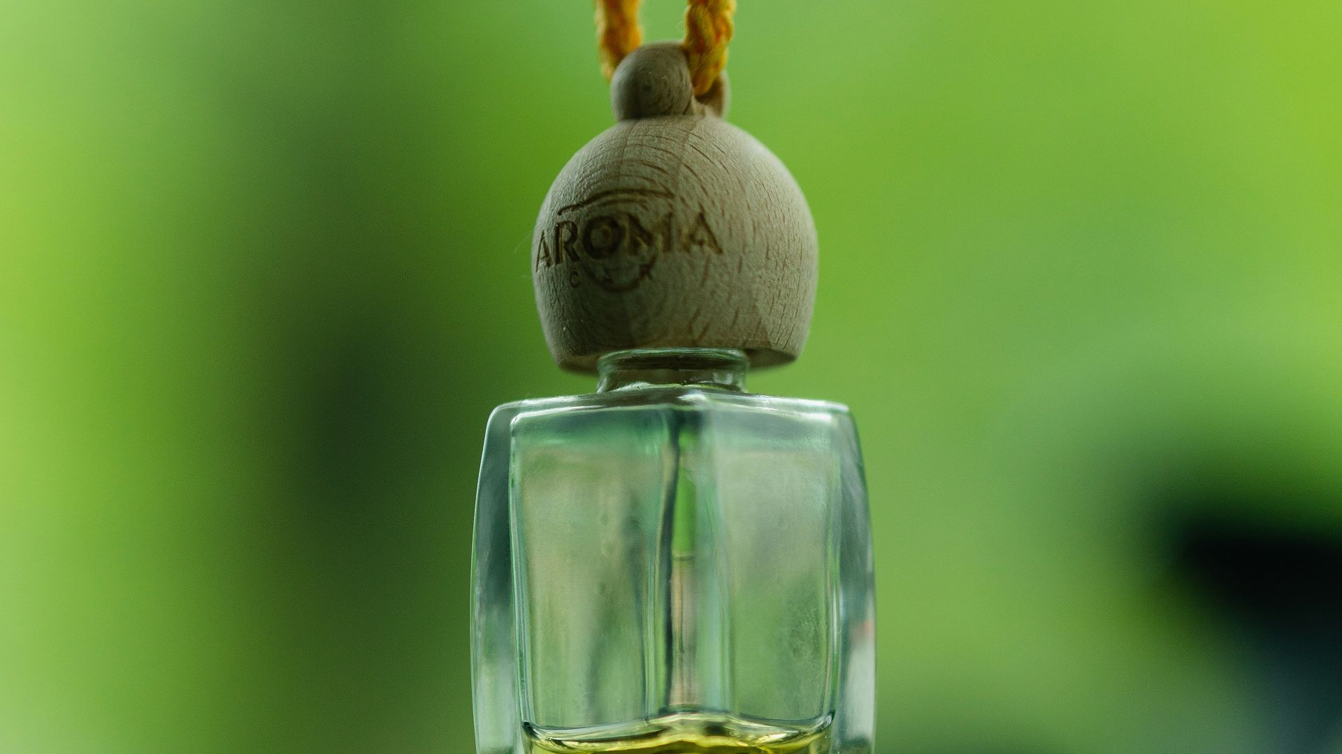 gold and clear glass bottle