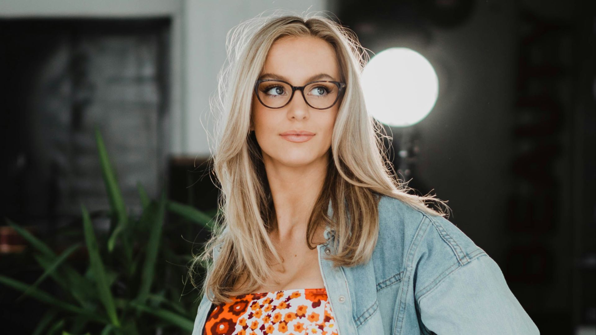 a woman wearing glasses