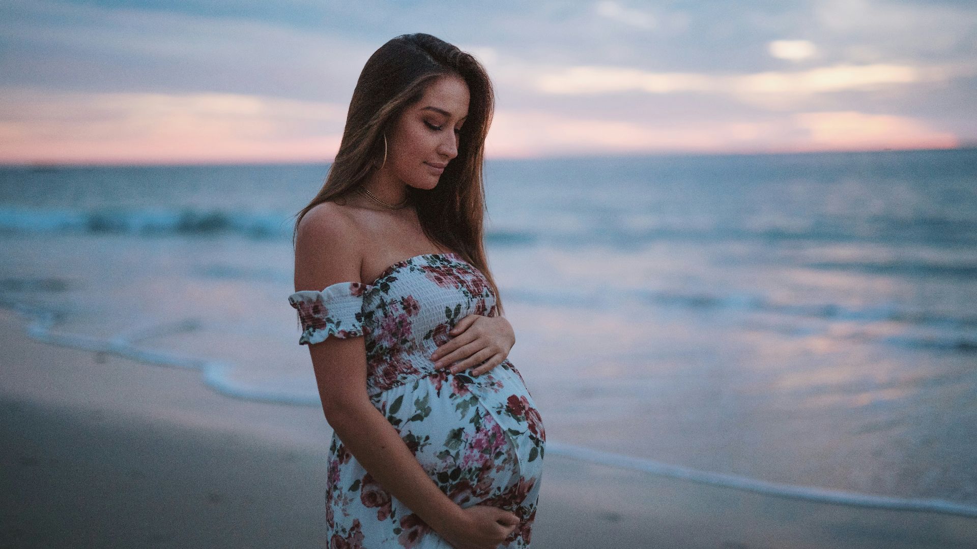pregnant woman in seashore
