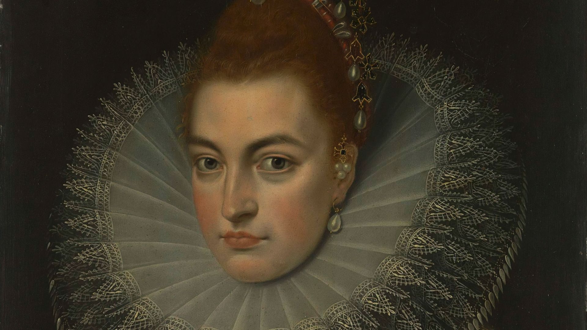 woman in gold and silver crown