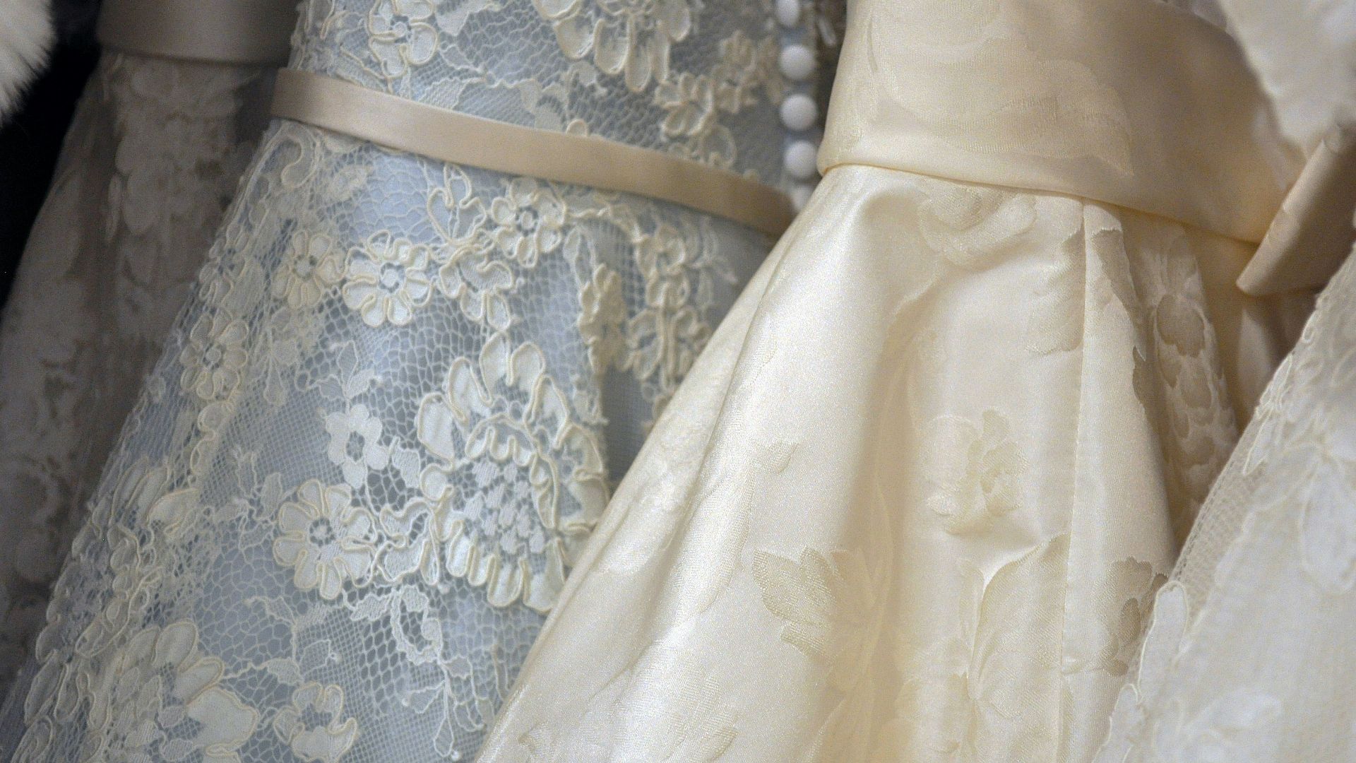 white and beige floral textiles