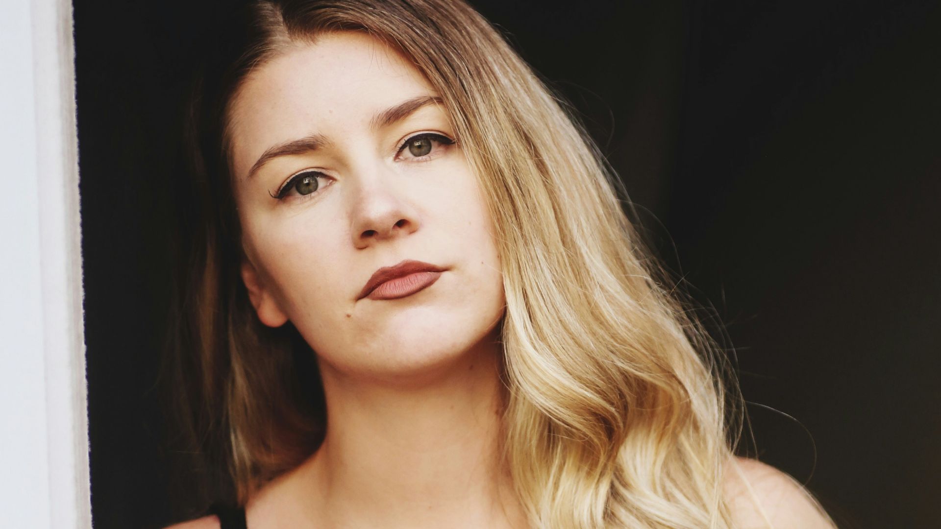 woman in black tank top