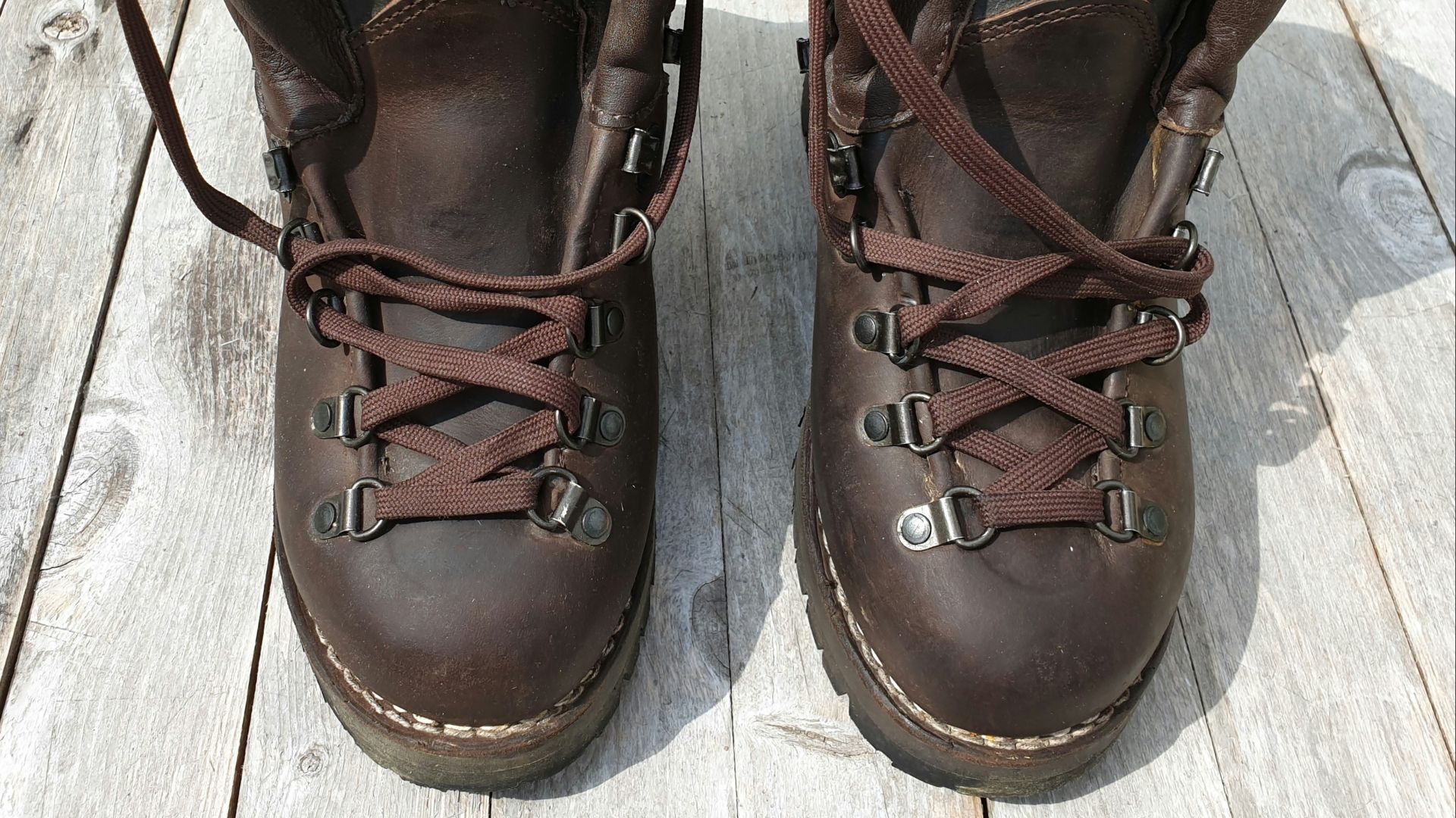 pair of brown leather boots