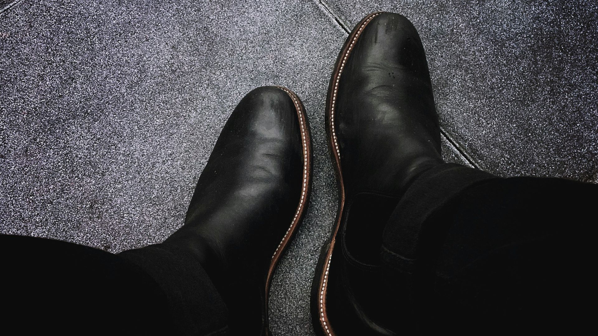 man wears black dress shoes