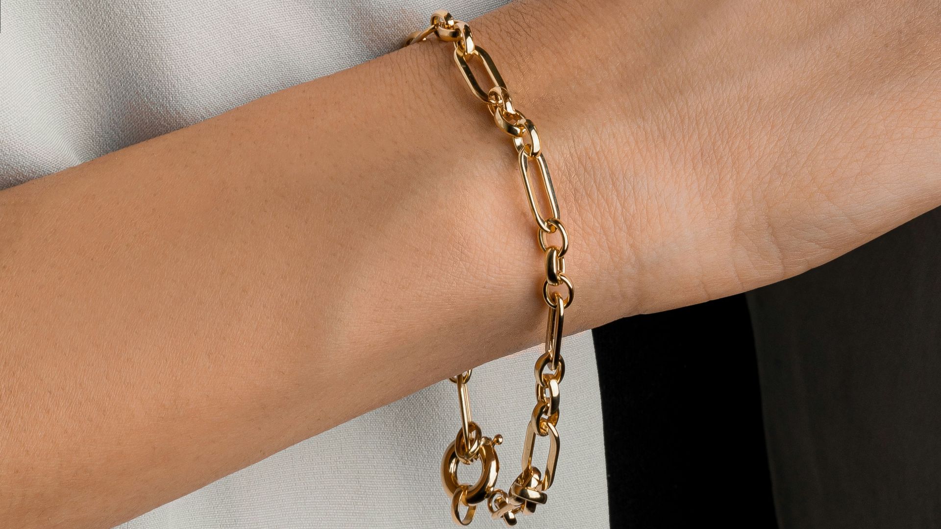 a close up of a person wearing a bracelet