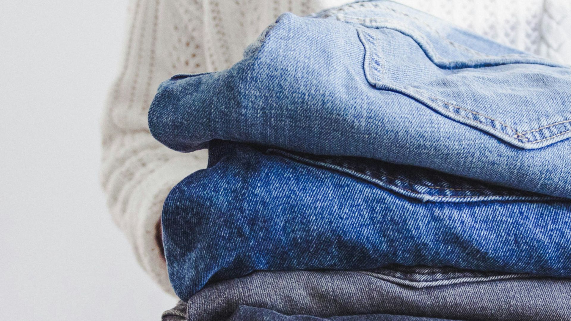 blue and white textile on white textile
