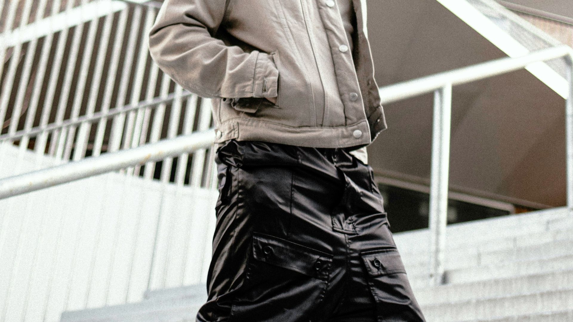 a man standing on some steps in front of a building