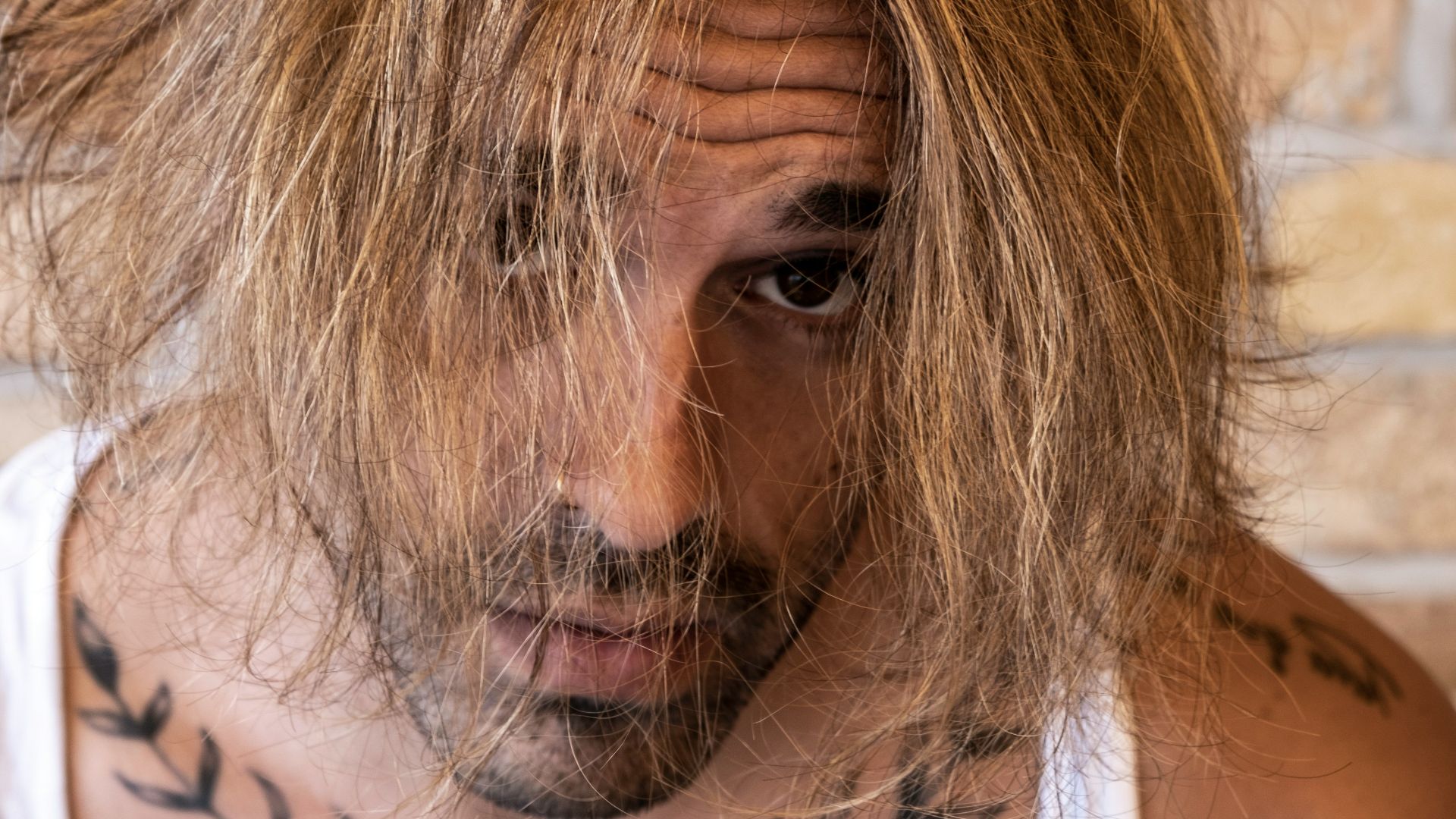 woman in white tank top