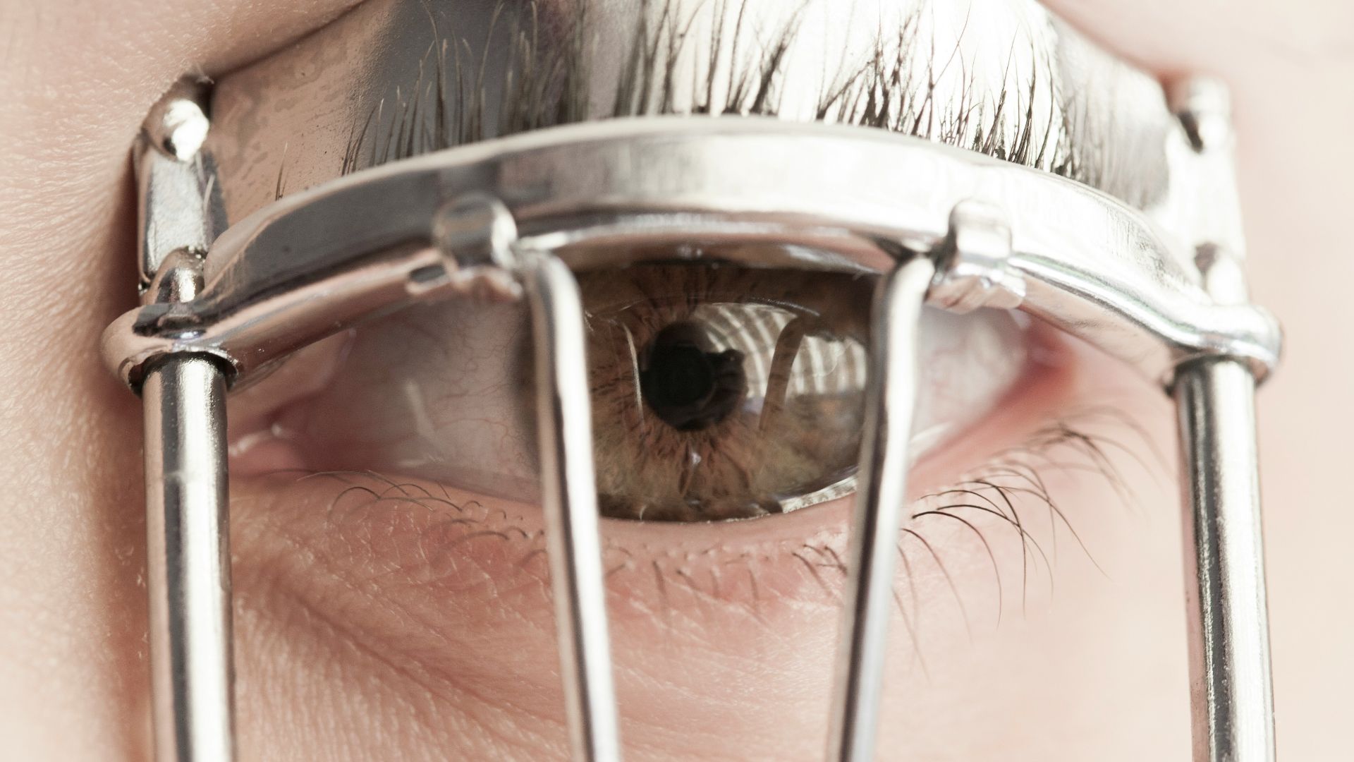person wearing silver framed eyeglasses