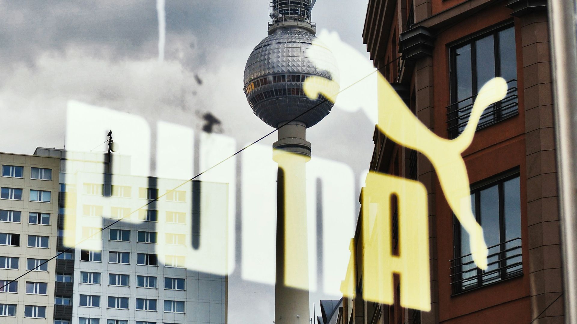 a view of a clock tower through a window