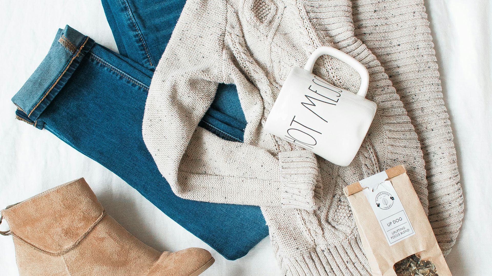 gray cardigan, blue jeans, and pair of brown chunky heeled shoes