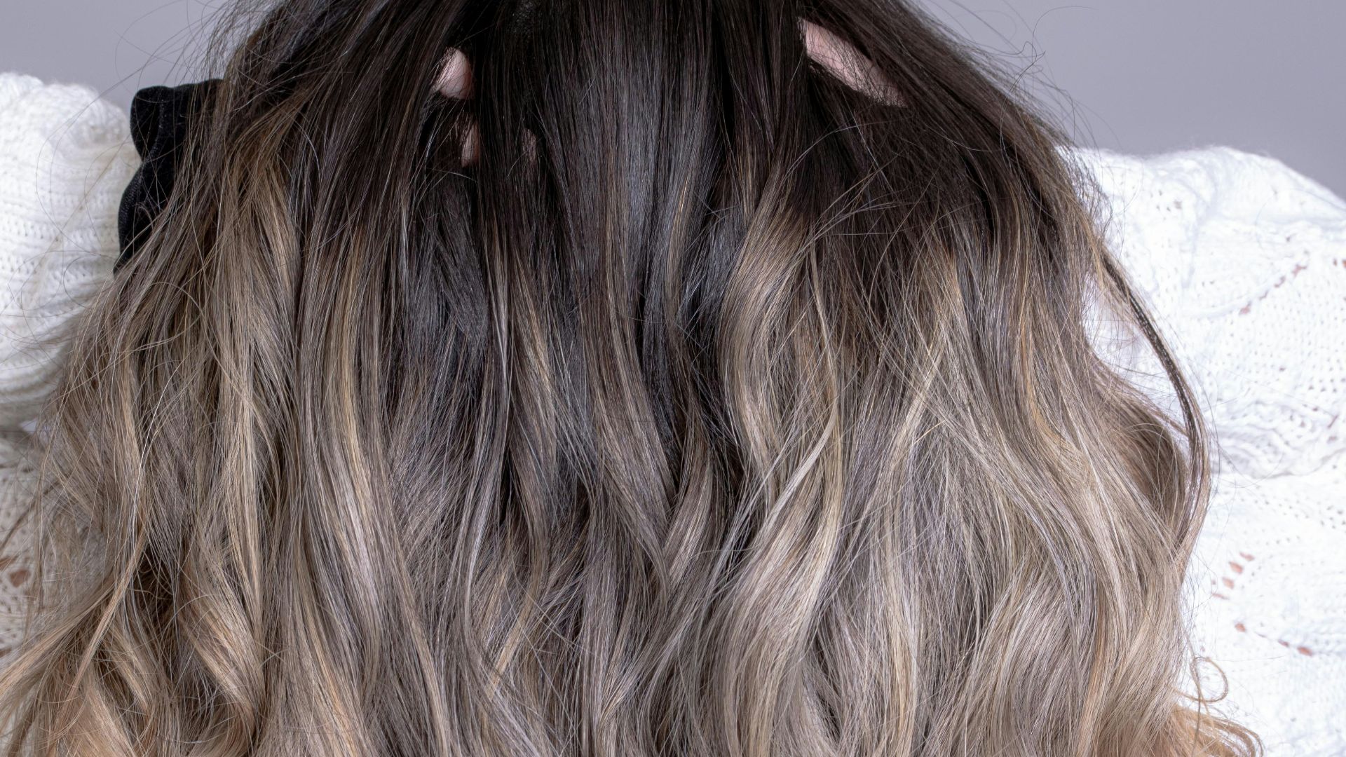 woman in white shirt with blonde hair