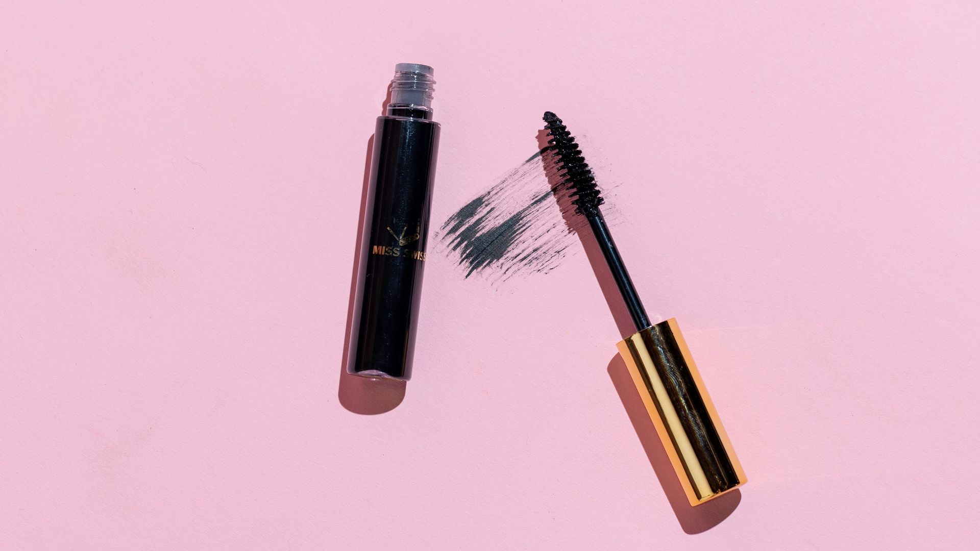 silver and black makeup brush