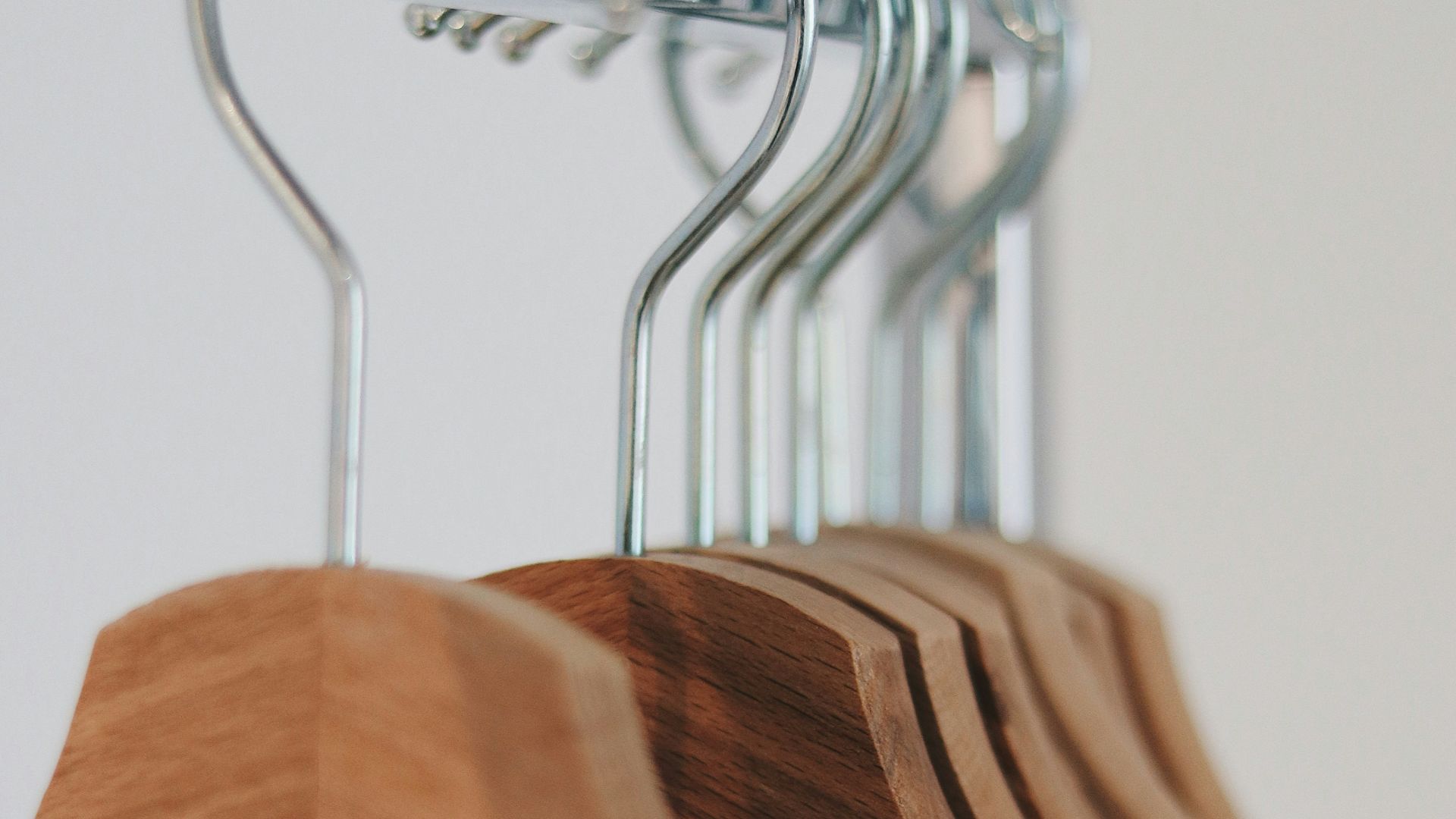 brown wooden clothes hangers