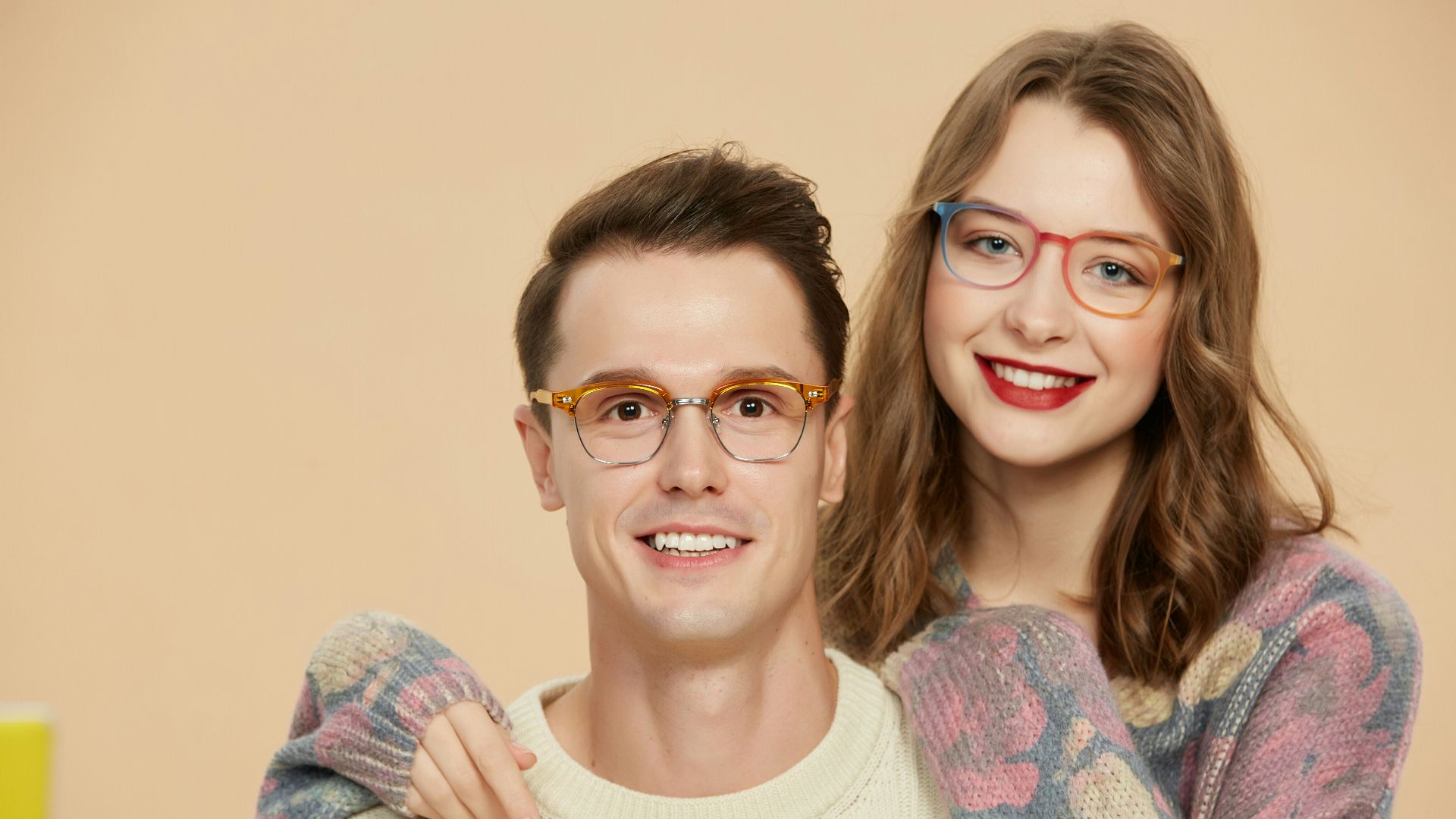 A man and a woman standing next to each other
